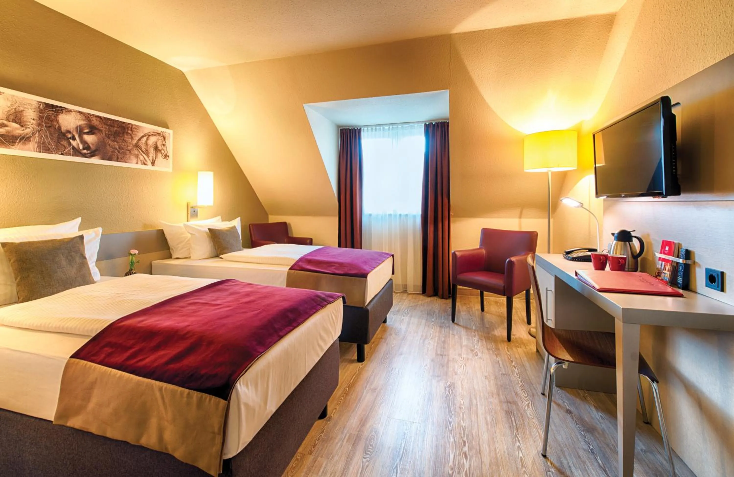 Photo of the whole room, Bed in Leonardo Hotel Mannheim-Ladenburg