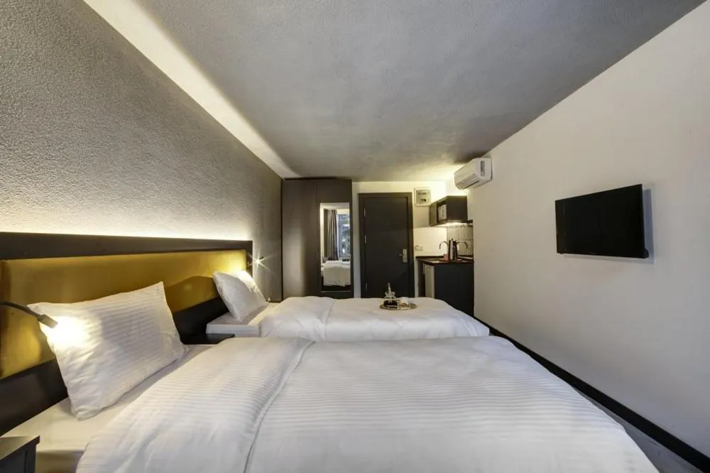 Photo of the whole room, Bed in Taksim Seya Suites Hotel