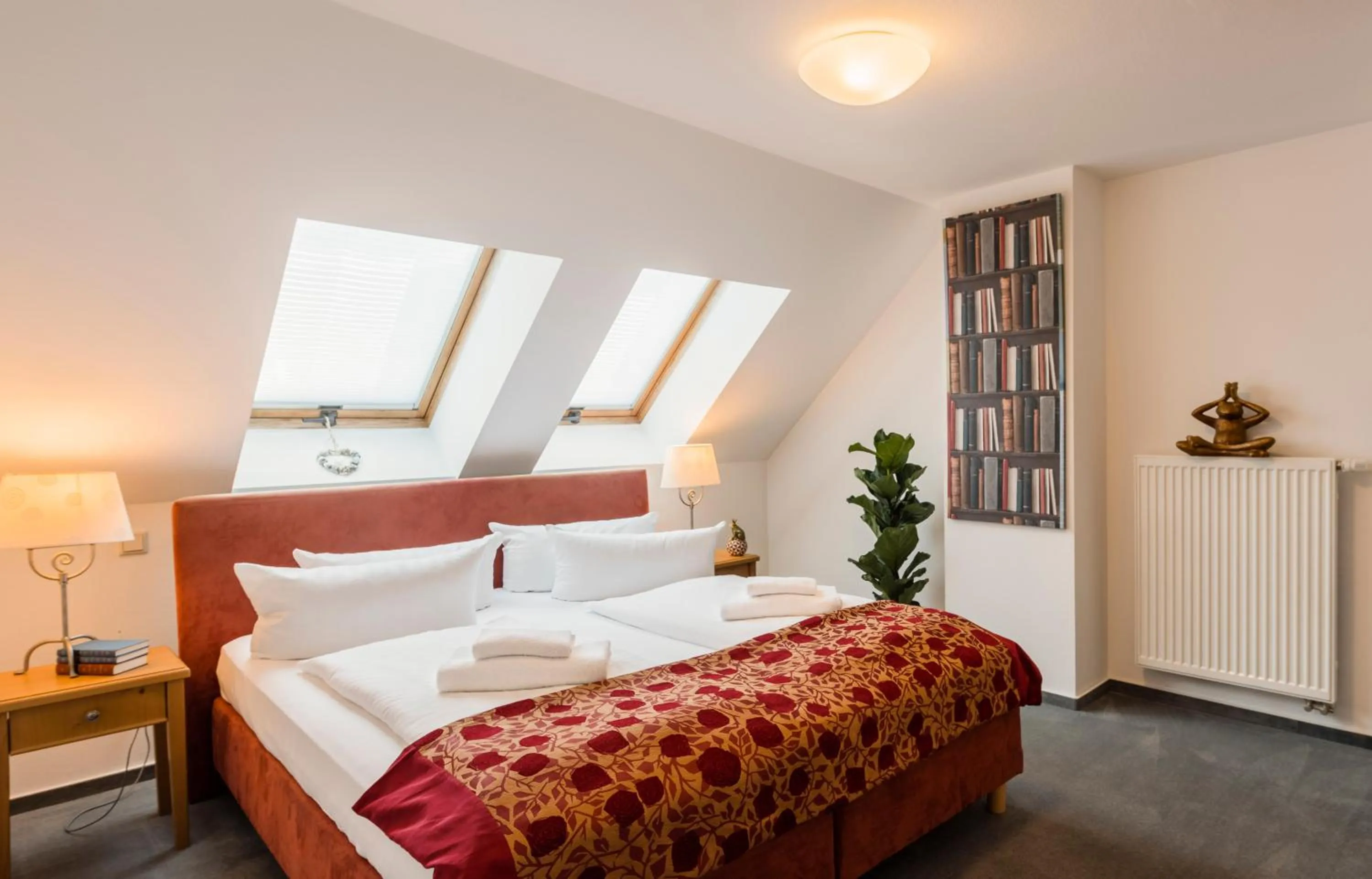 Photo of the whole room, Bed in Apparthotel Bad Schandau by STEIGER Hotels