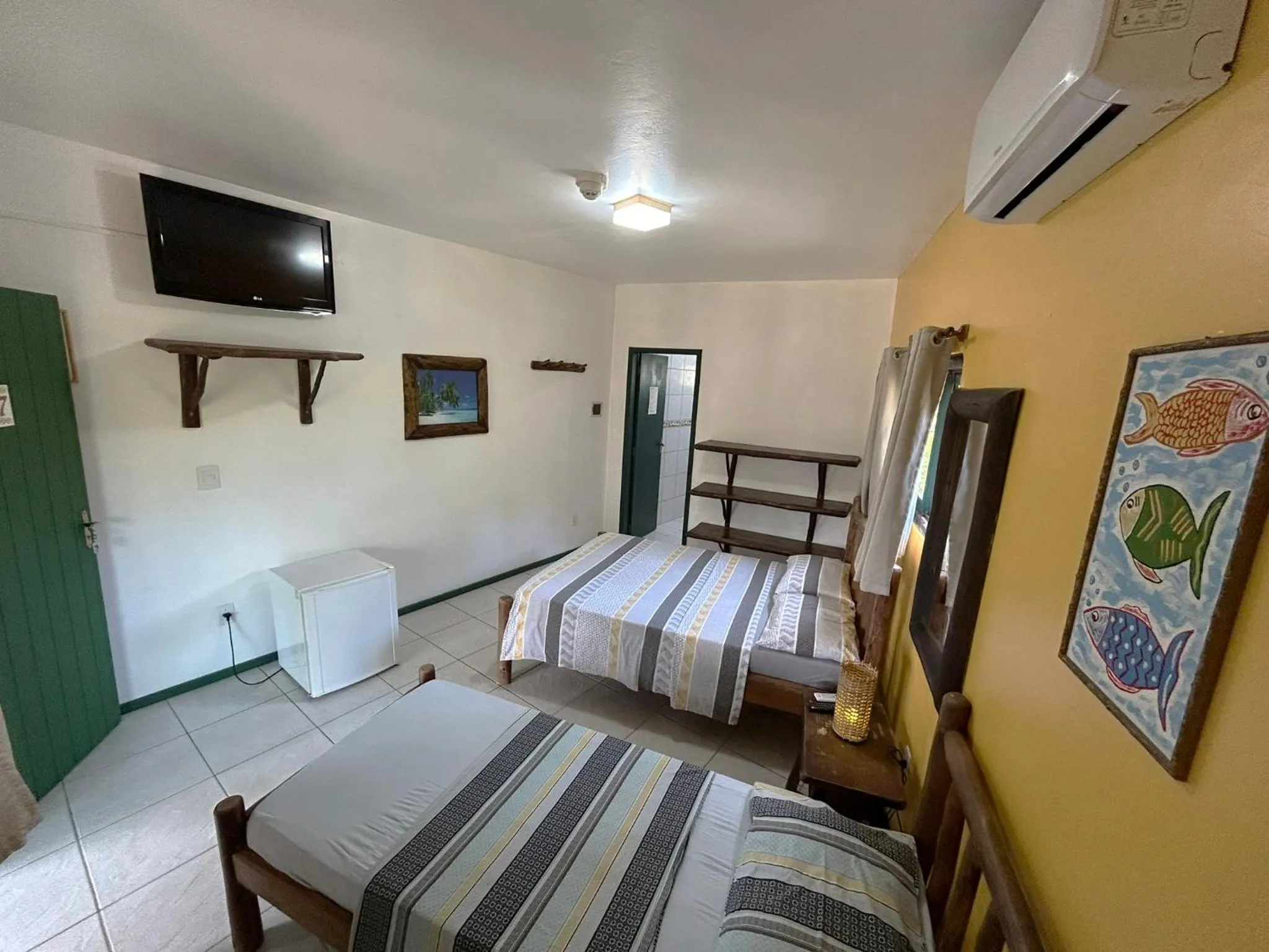 Photo of the whole room, Bed in Pousada Beleza Pura na Praia da Ferrugem