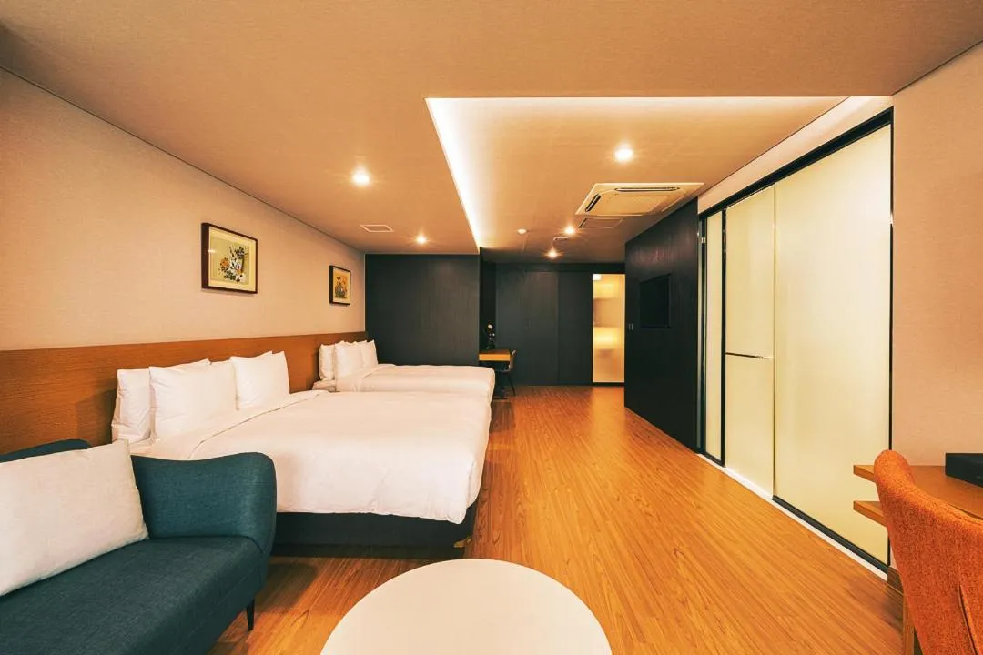 Bed in Kwangsu Hotel Haeundae