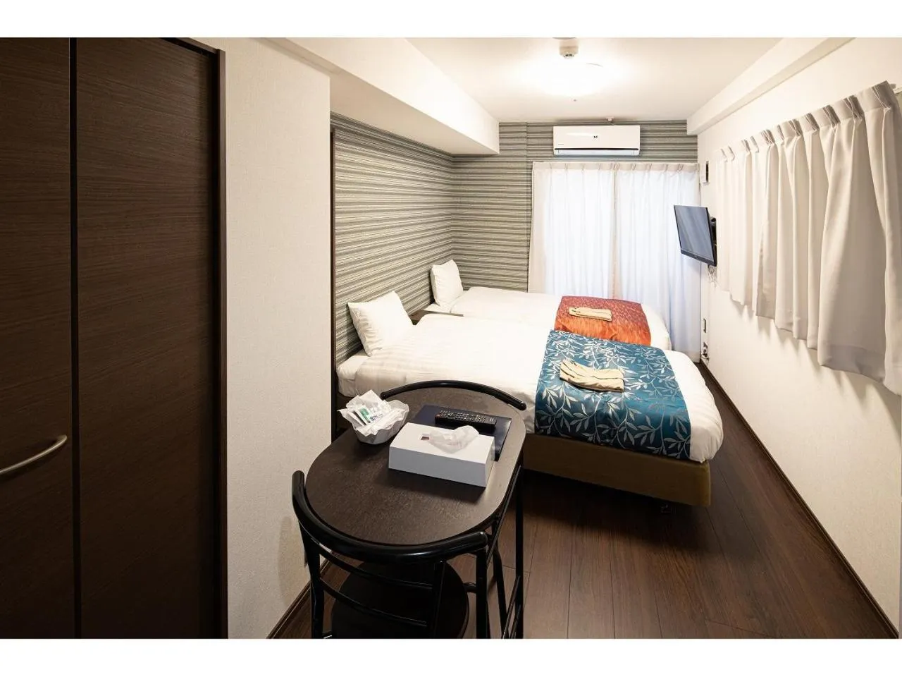 Photo of the whole room, Bed in Coruscant Hotel NagasakiekiⅡ