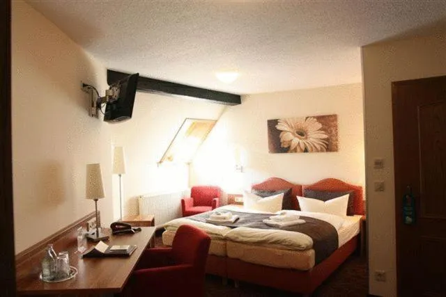 Photo of the whole room, Bed in Hotel Goldener Hirsch