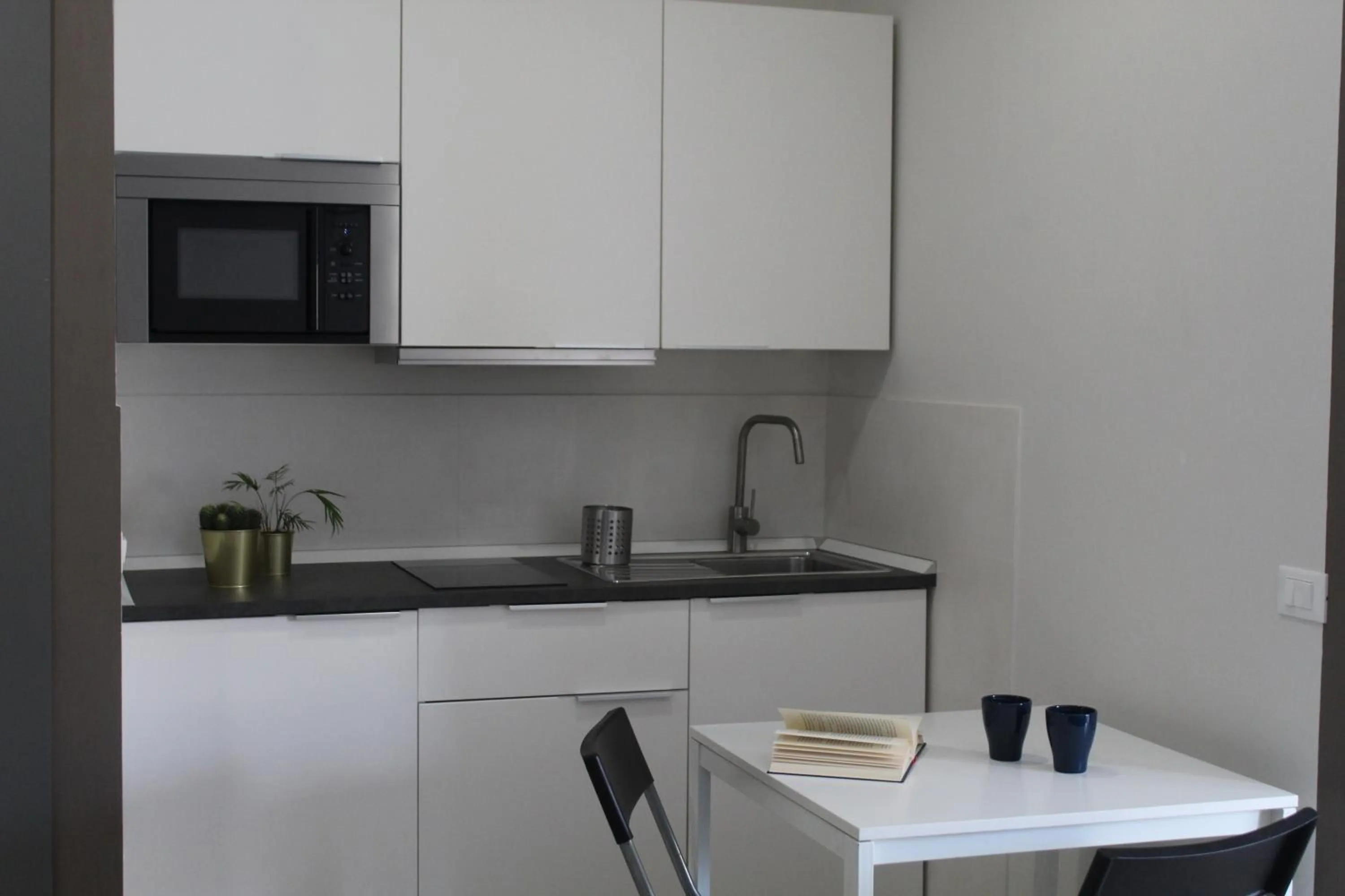 Kitchen or kitchenette in Residenza Conti