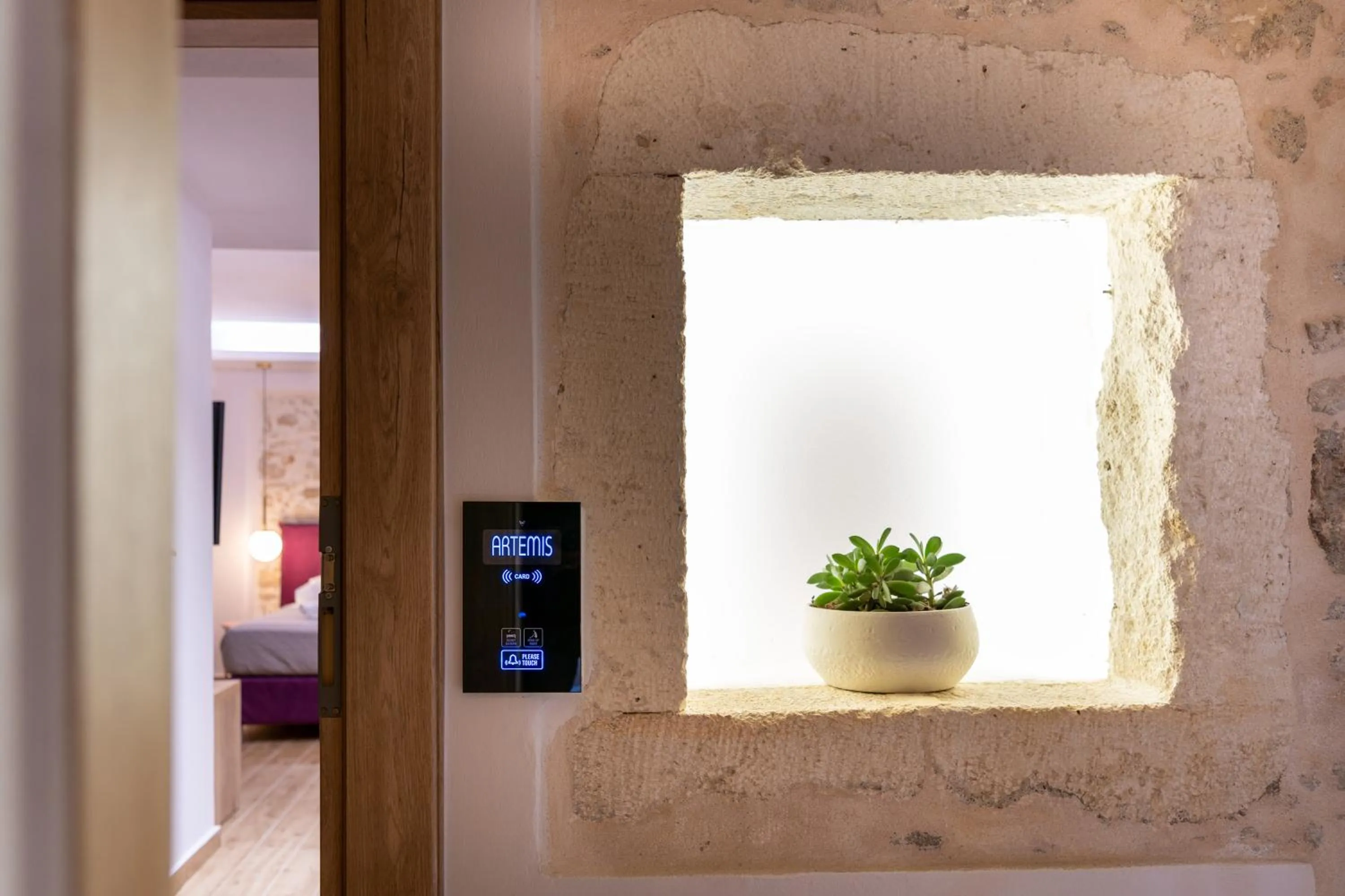 Text overlay in Erotokritos City Luxury Suites