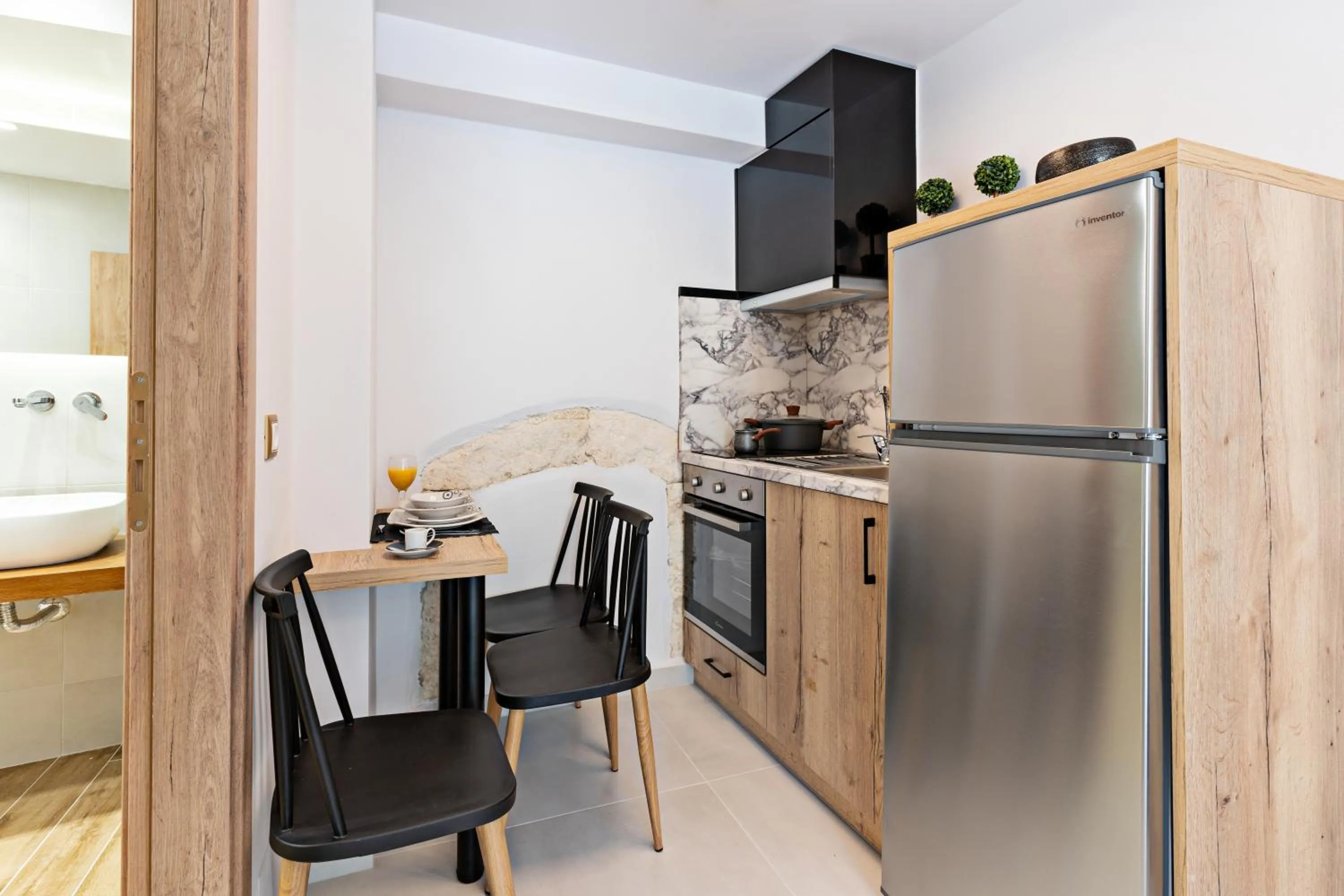 Kitchen or kitchenette in Erotokritos City Luxury Suites