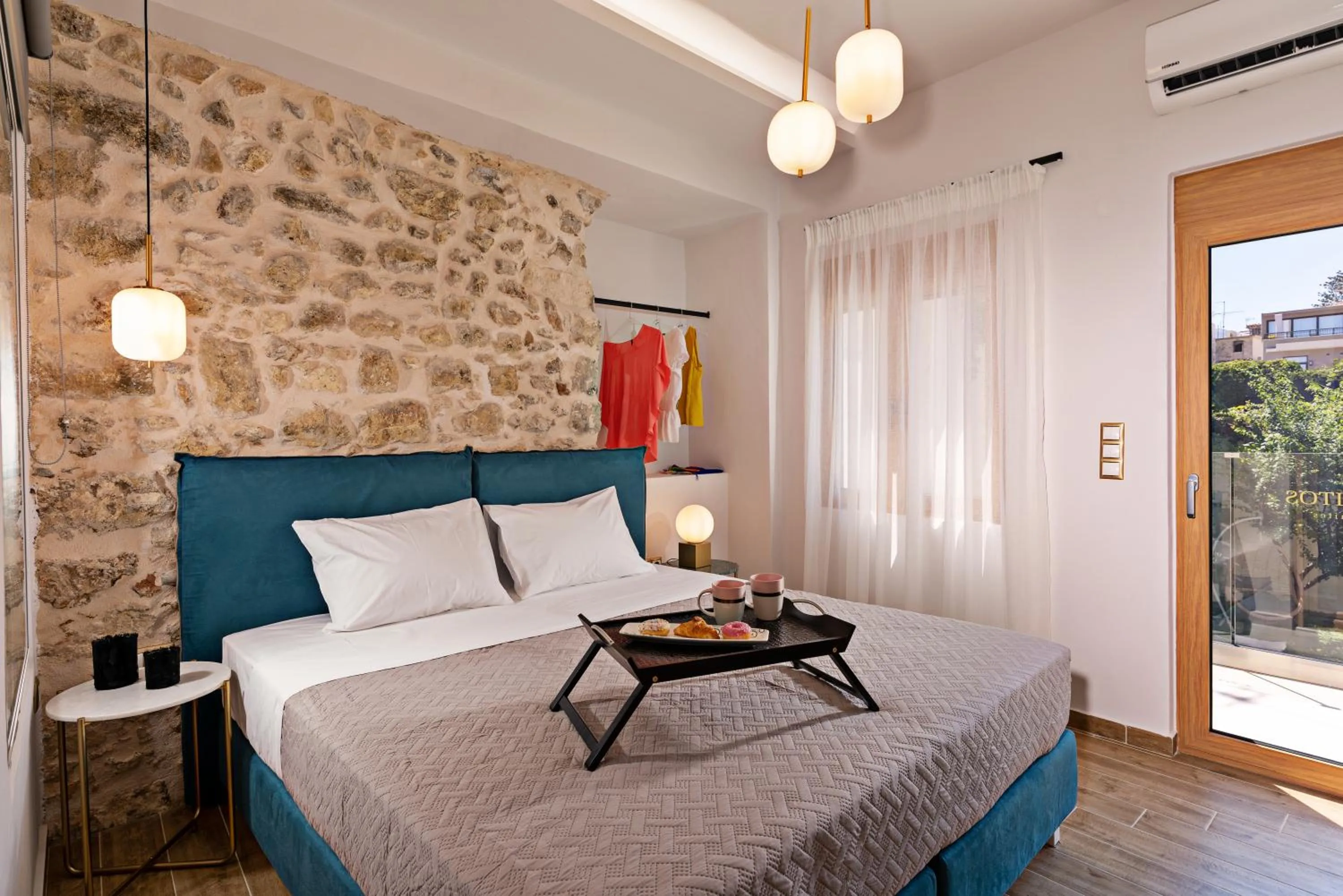 Bed in Erotokritos City Luxury Suites