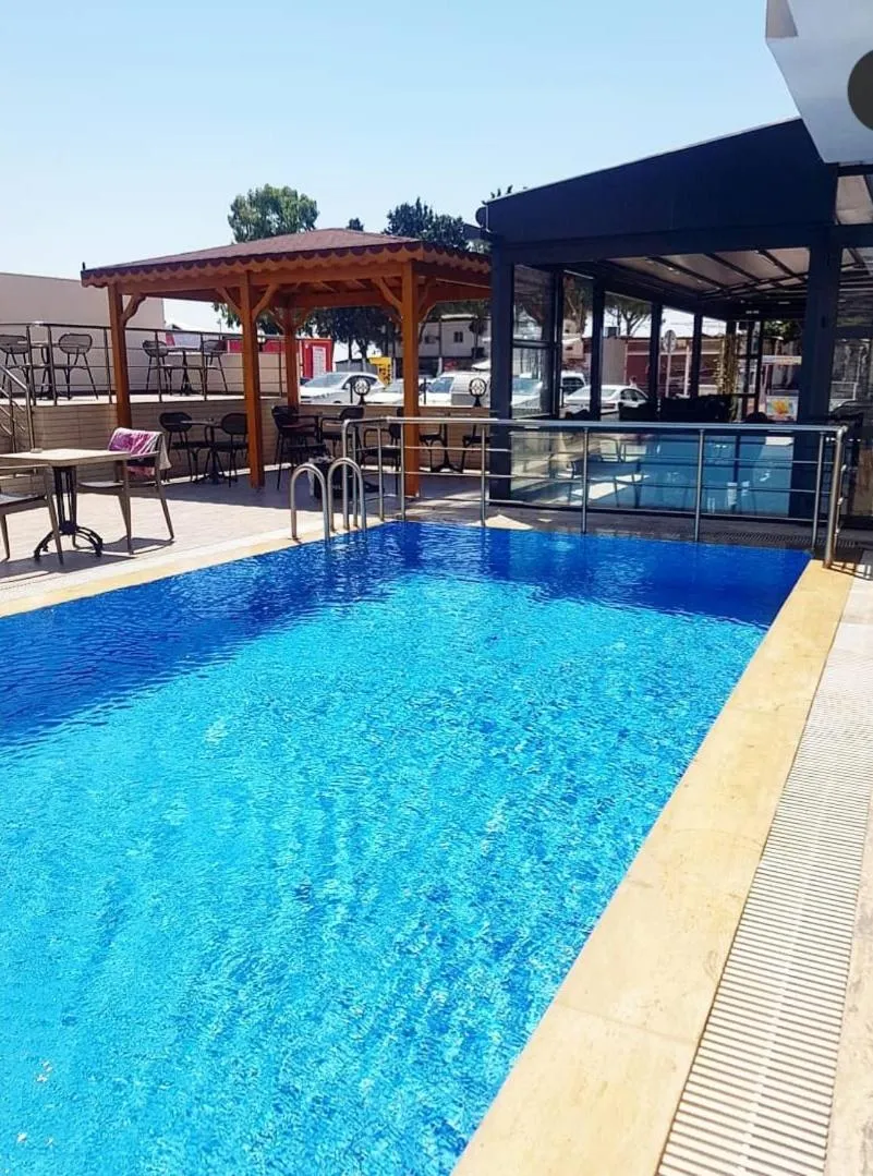 Swimming pool in Antioch Apart Otel