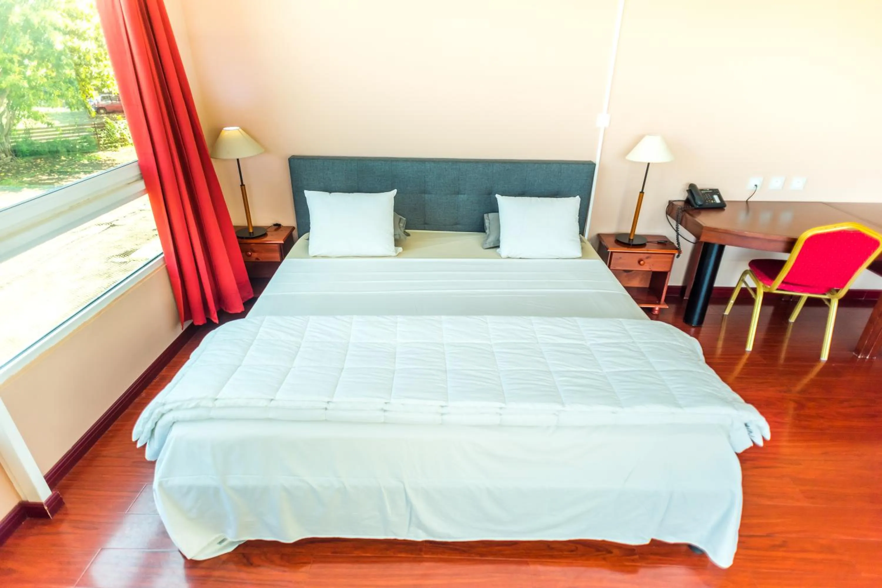 Bed in Hotel Sarah Nui