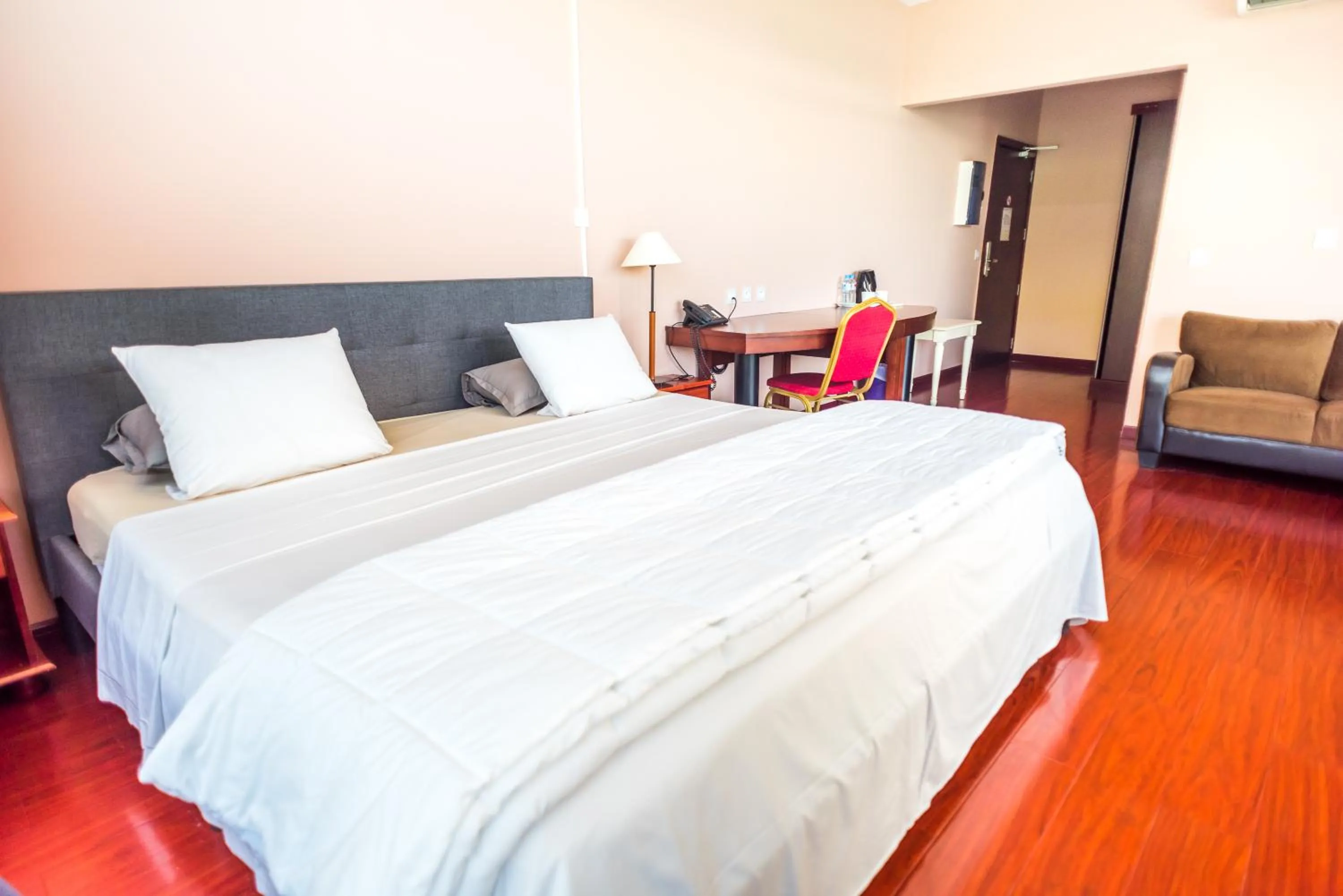 Bed in Hotel Sarah Nui