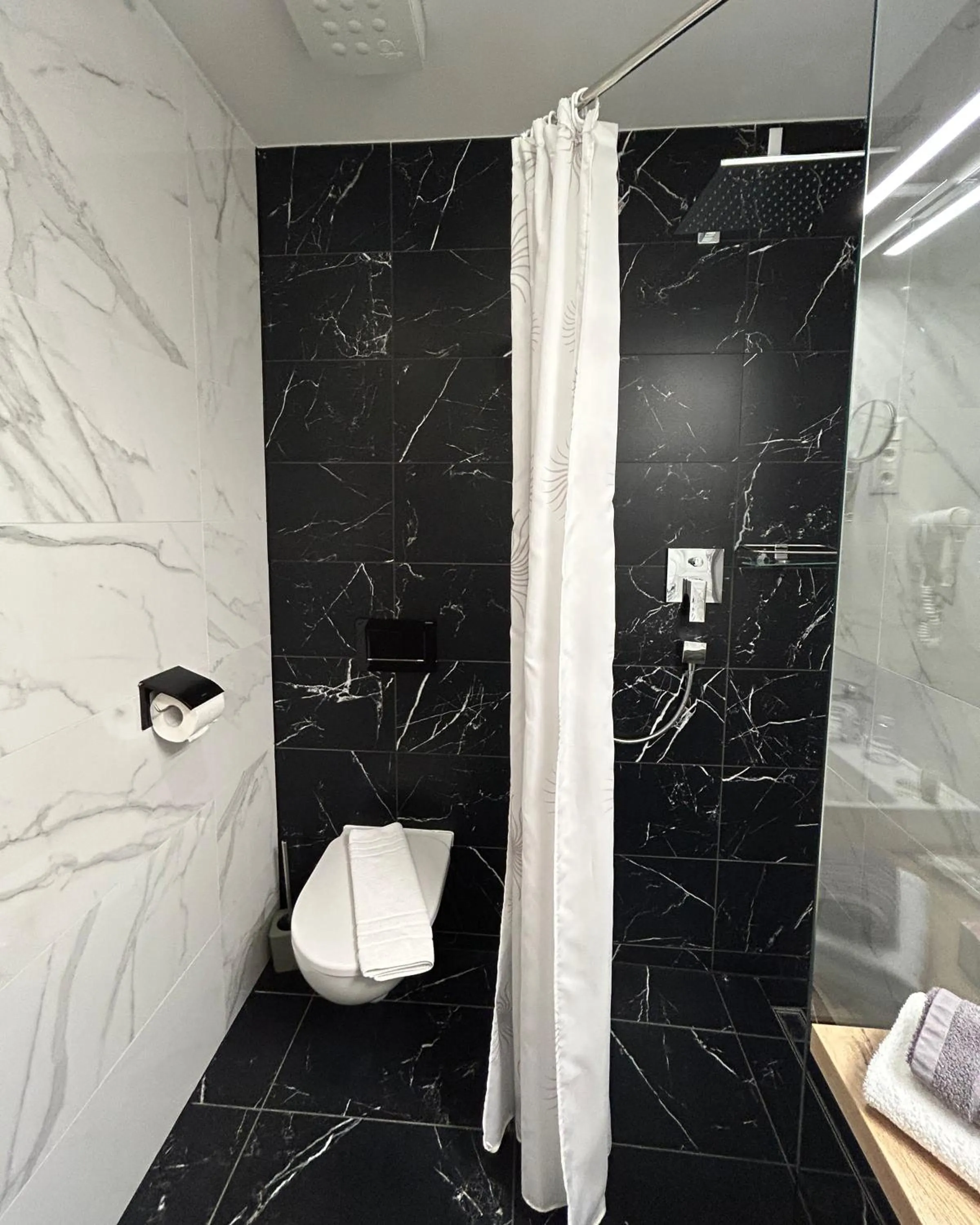 Bathroom in Fibula Residence Hotel & Wellness - Adults Only