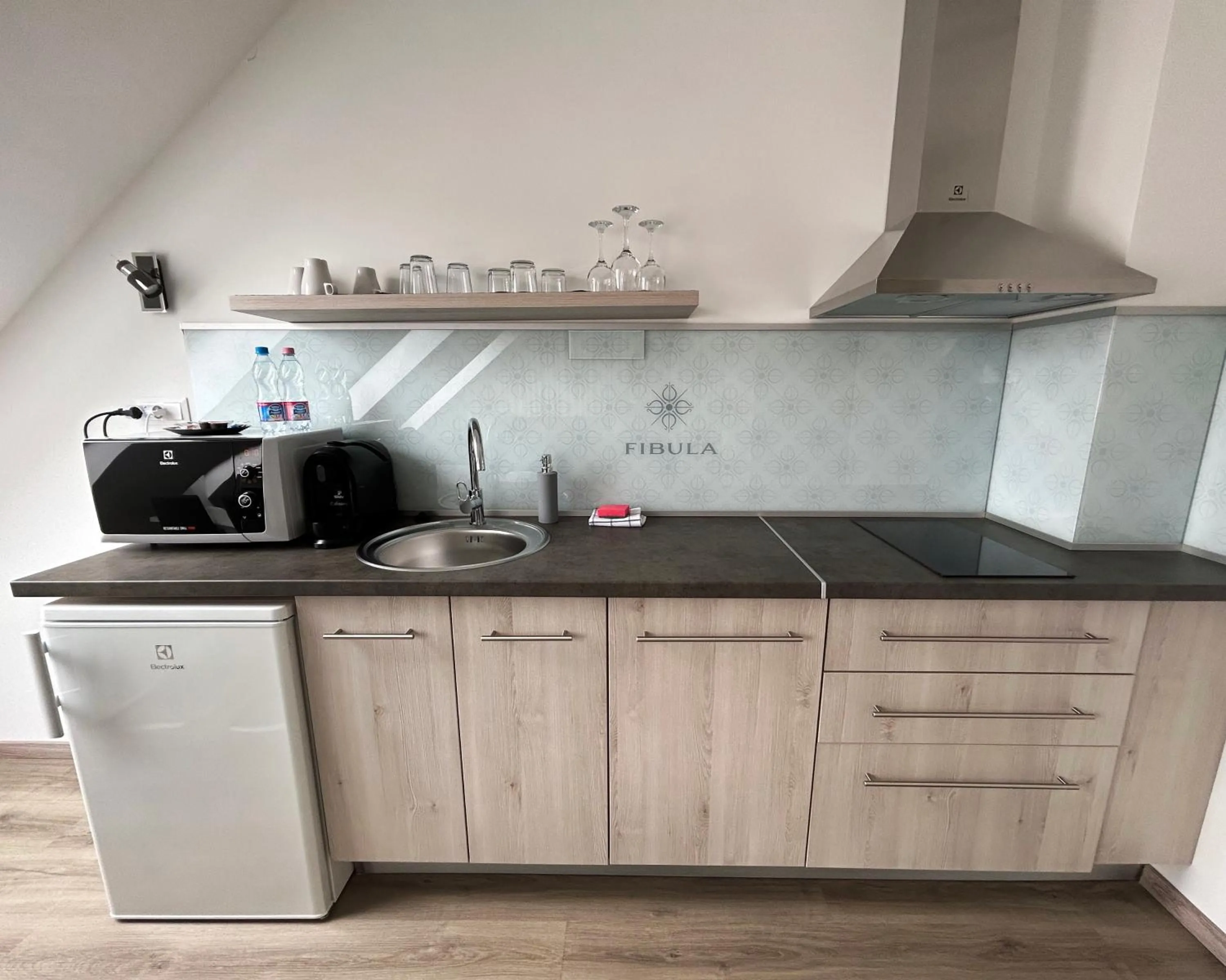 Kitchen or kitchenette in Fibula Residence Hotel & Wellness - Adults Only