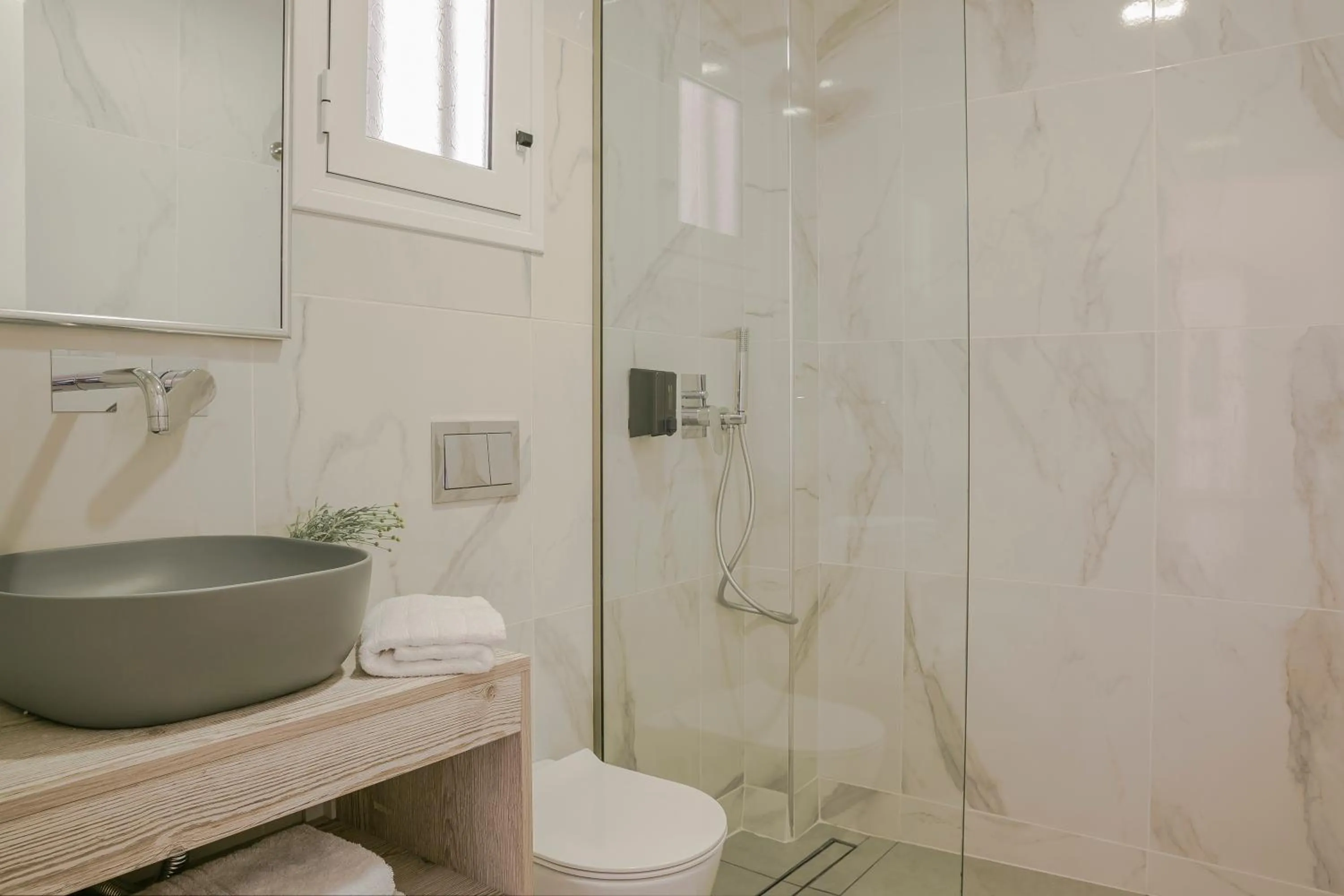 Shower in ASTRA Village Resort