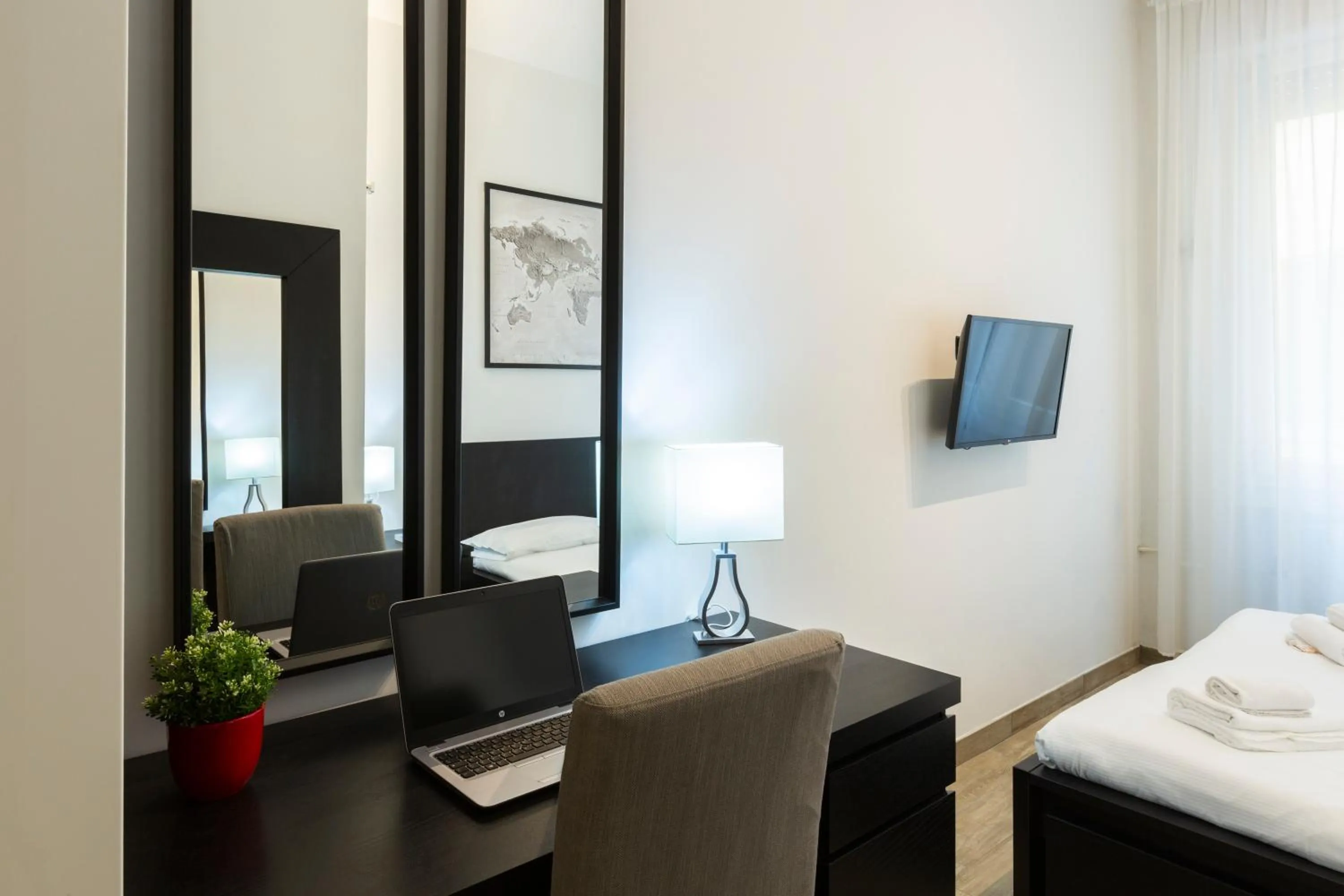 Bed in Yellow Line Apartment