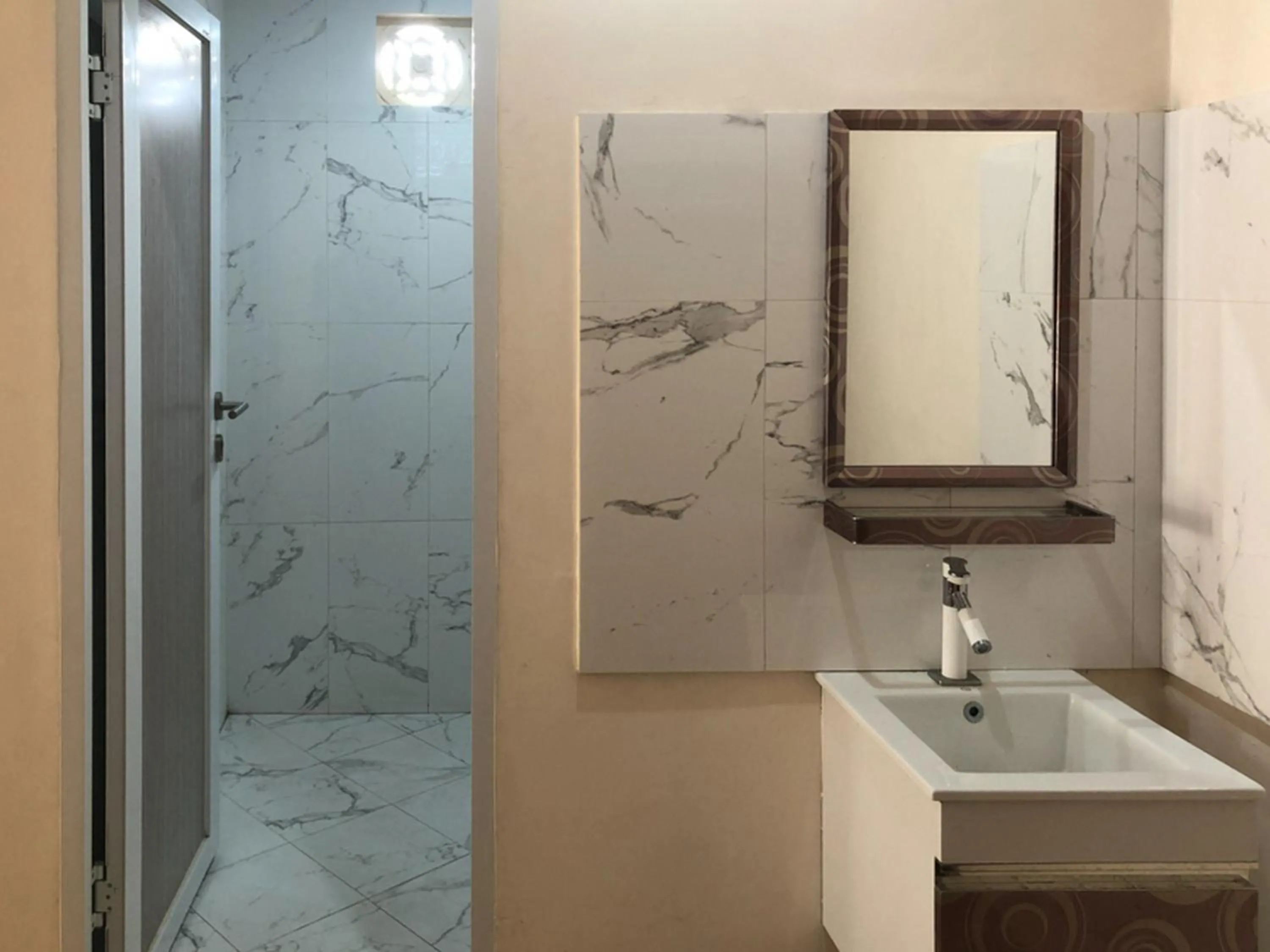 Bathroom in RedDoorz near XT Square 3