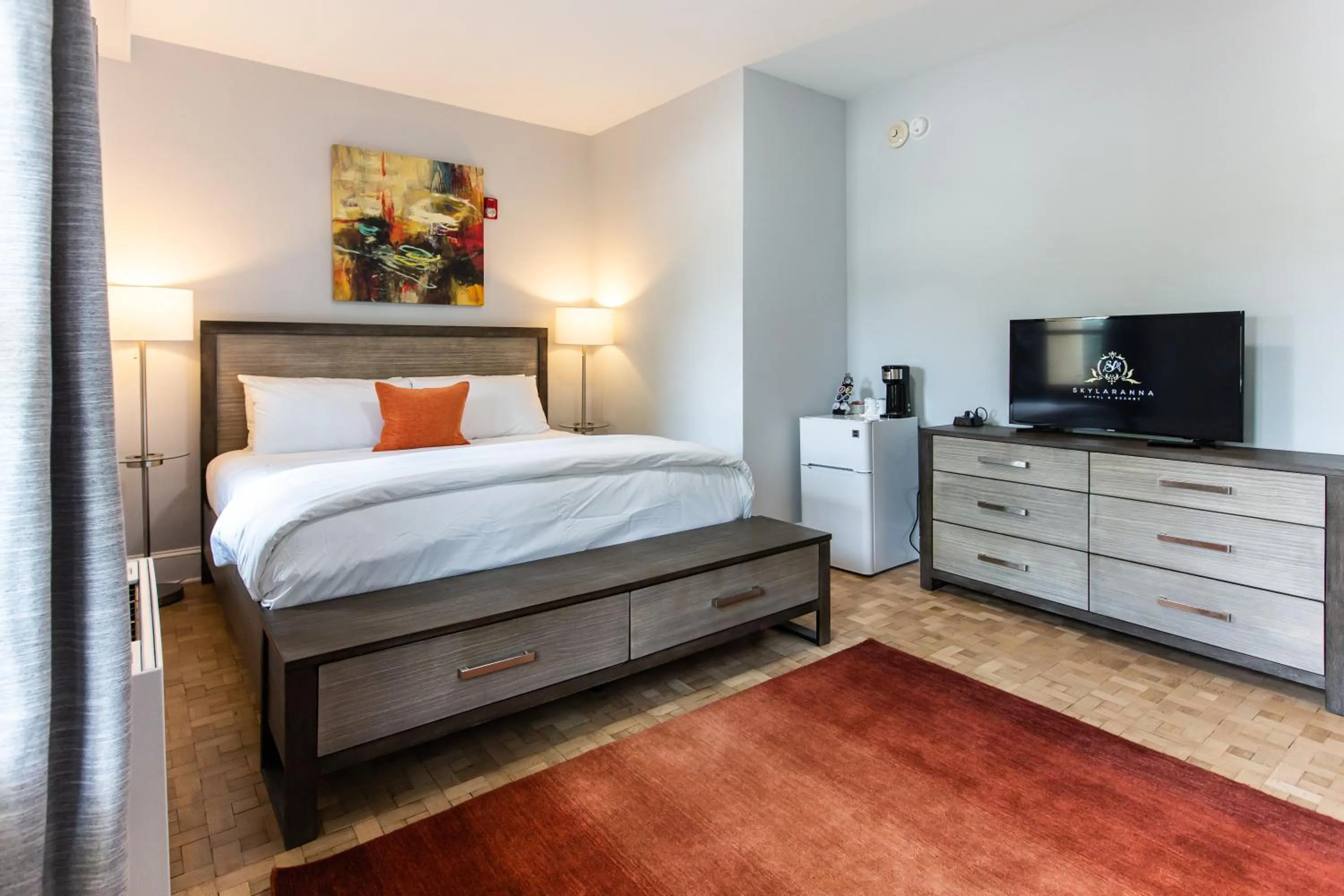 Bed in SKYLARANNA Resort & SPA