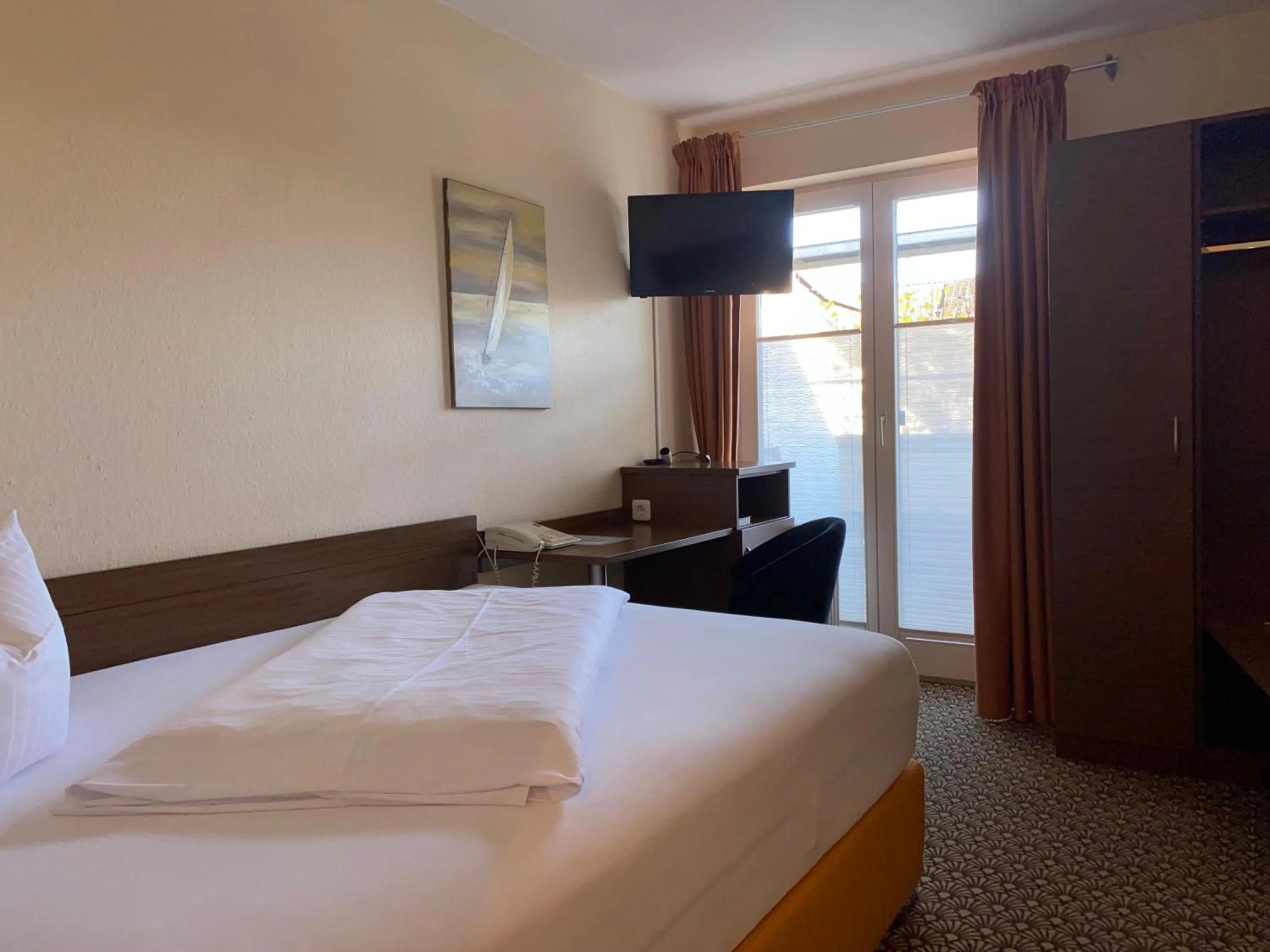 Photo of the whole room, Bed in Parkhotel Lindau