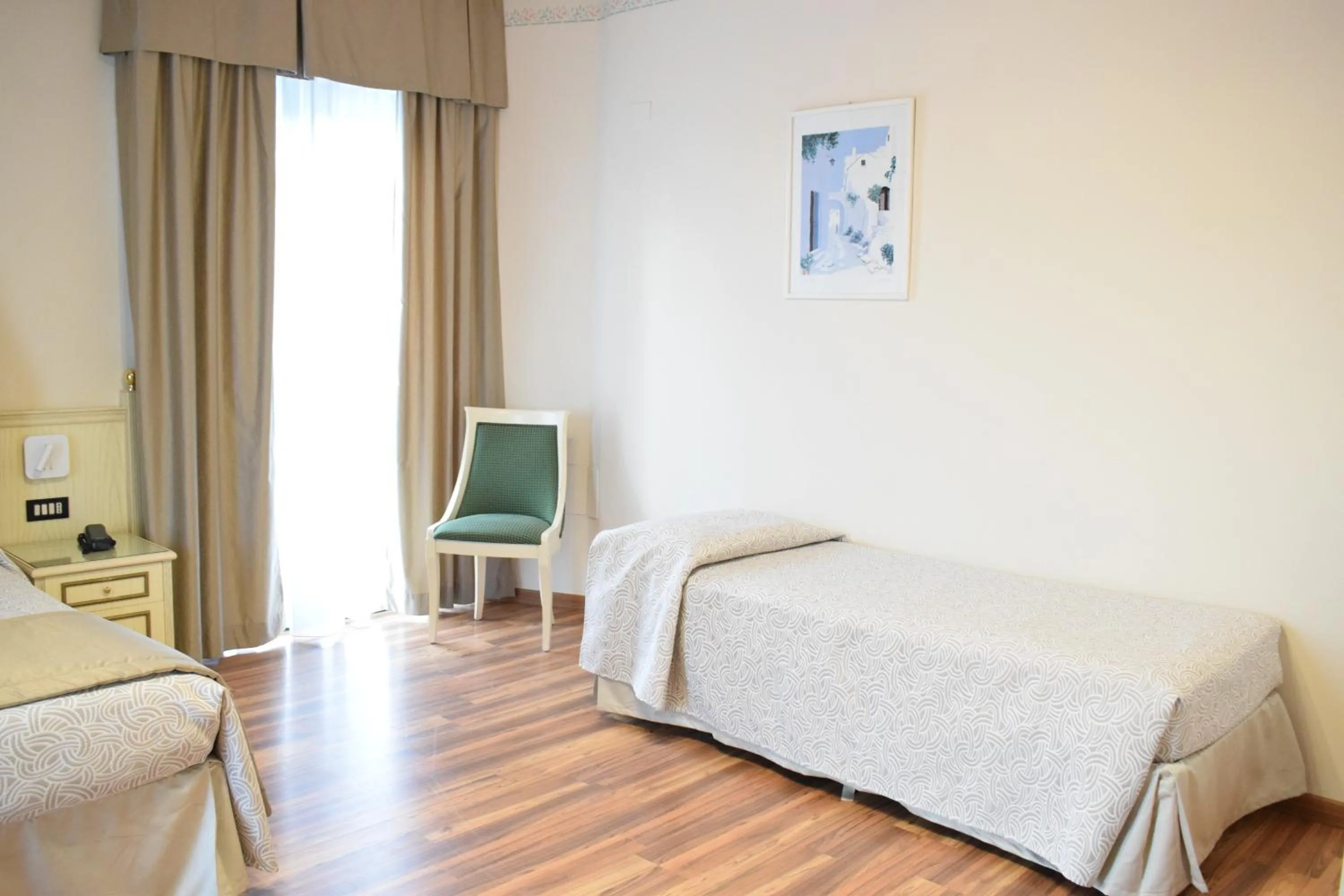 Bed in Hotel Carlton