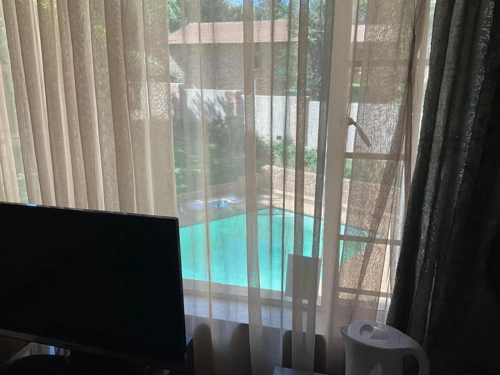 Pool view in Royal Olympia Lodges & Safaris RSA