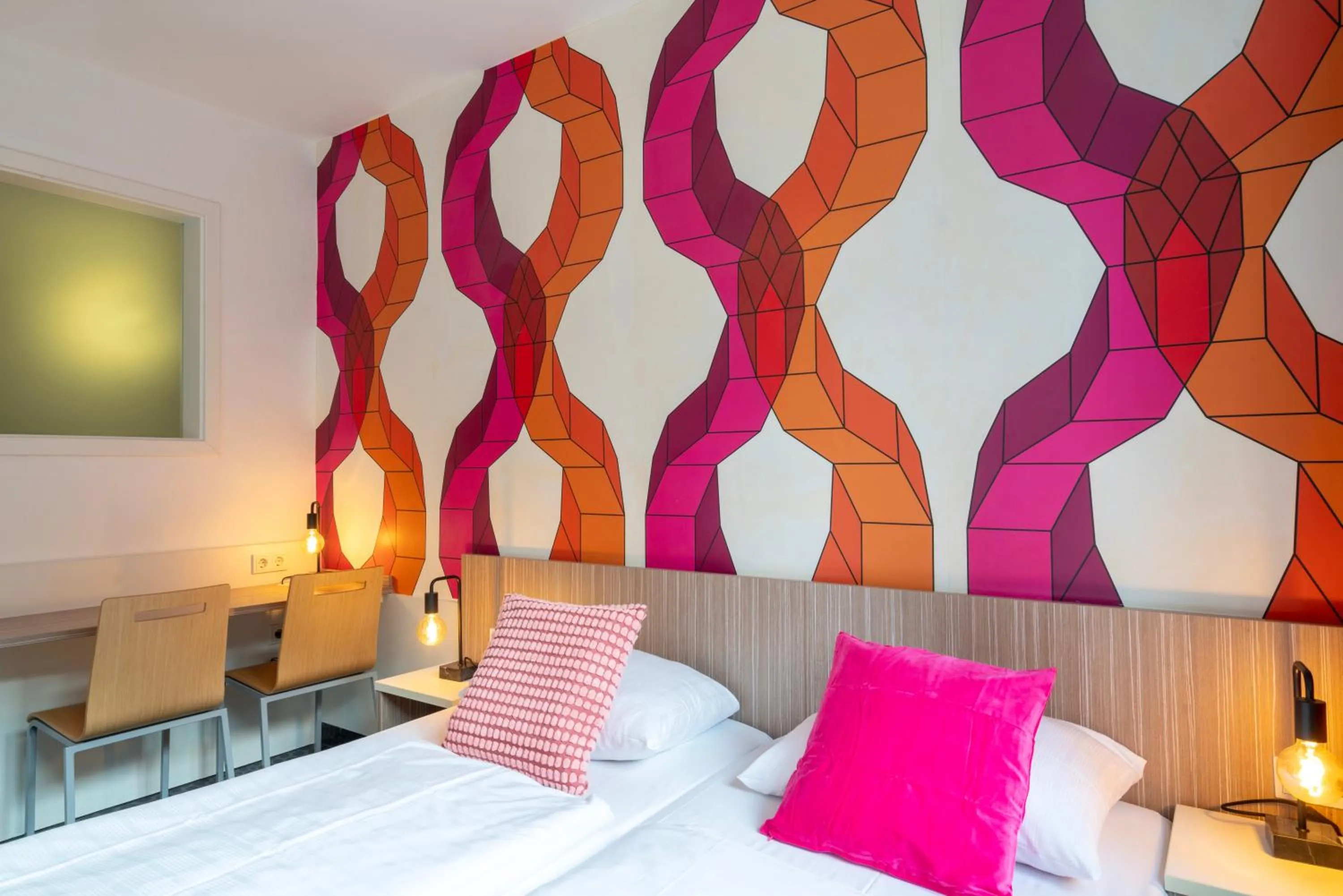 Living room, Bed in Hotel Madeleine Biohotel