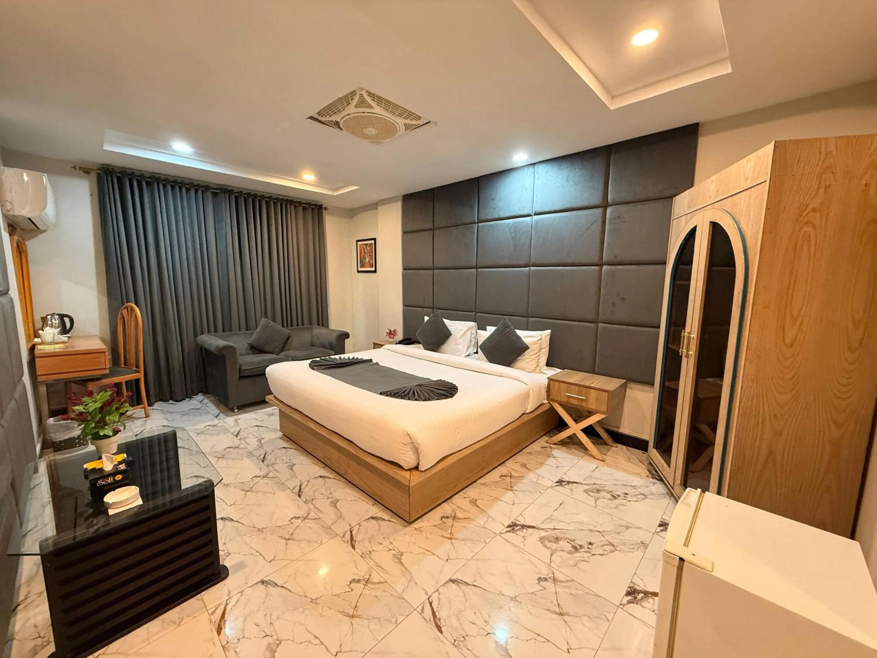 Bed in Atlas Hotel Islamabad