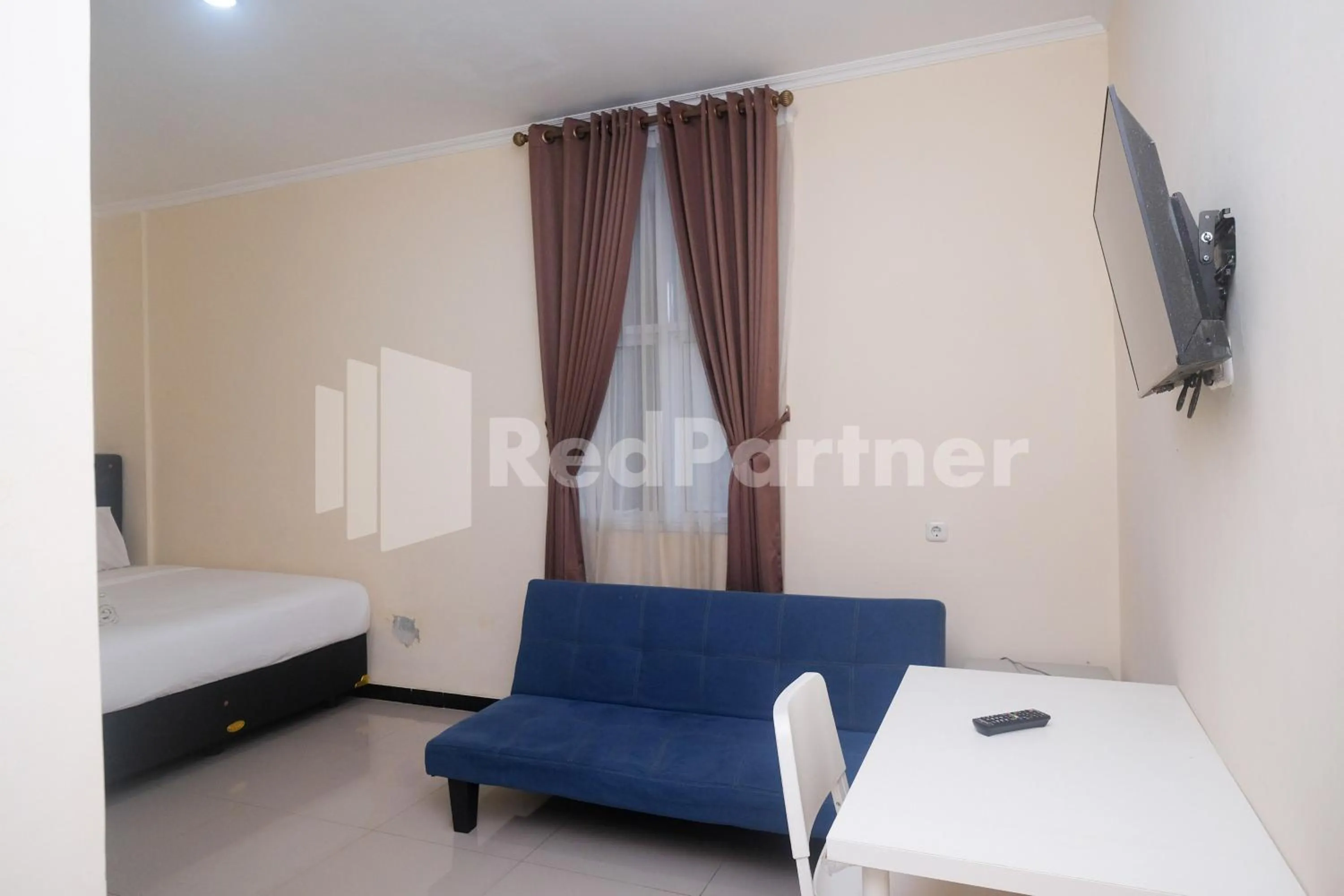 Bed in Griya Loka 2 Syariah Near Simpang Lima Mitra Reddoorz