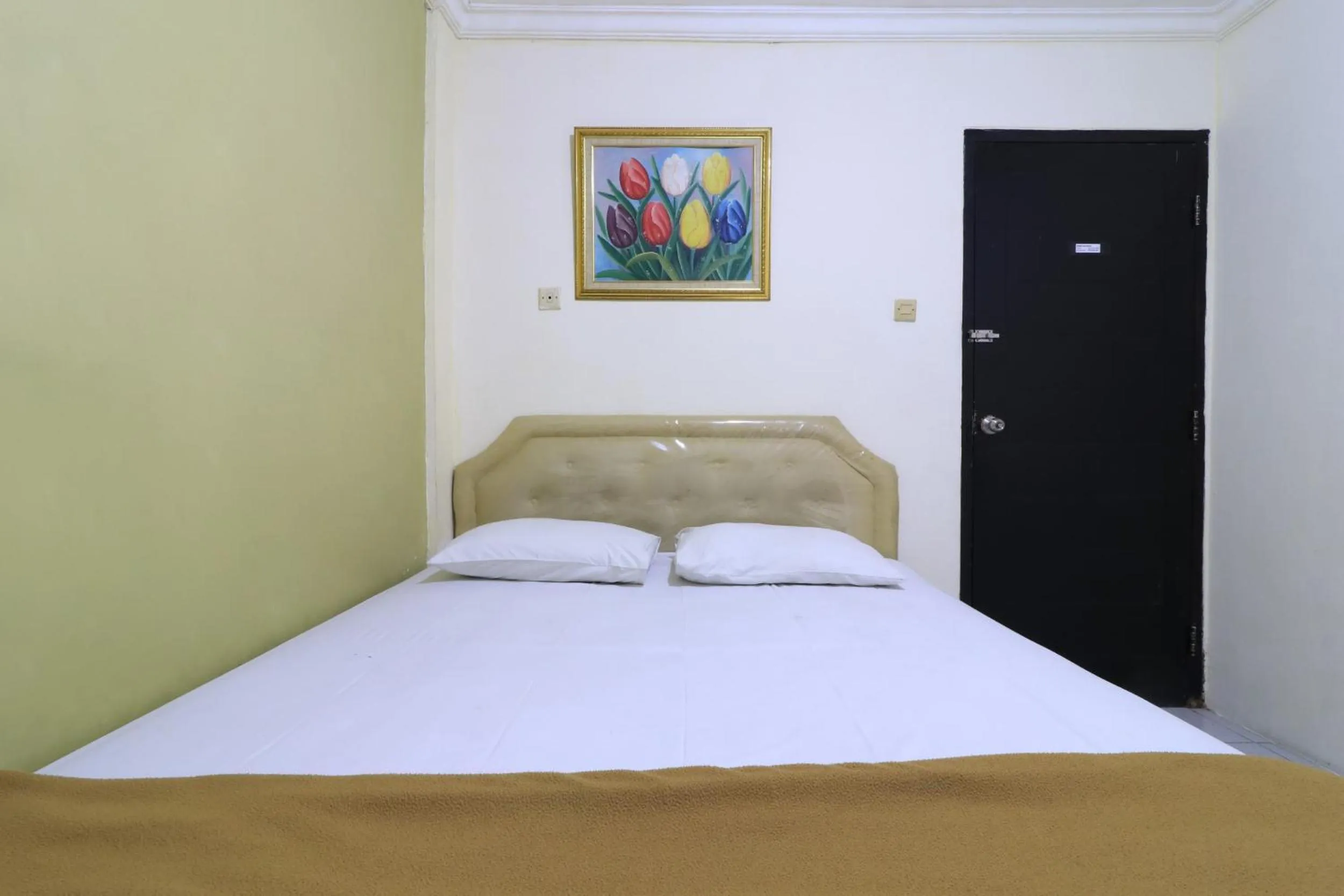 Bed in AMS Hotel Koja