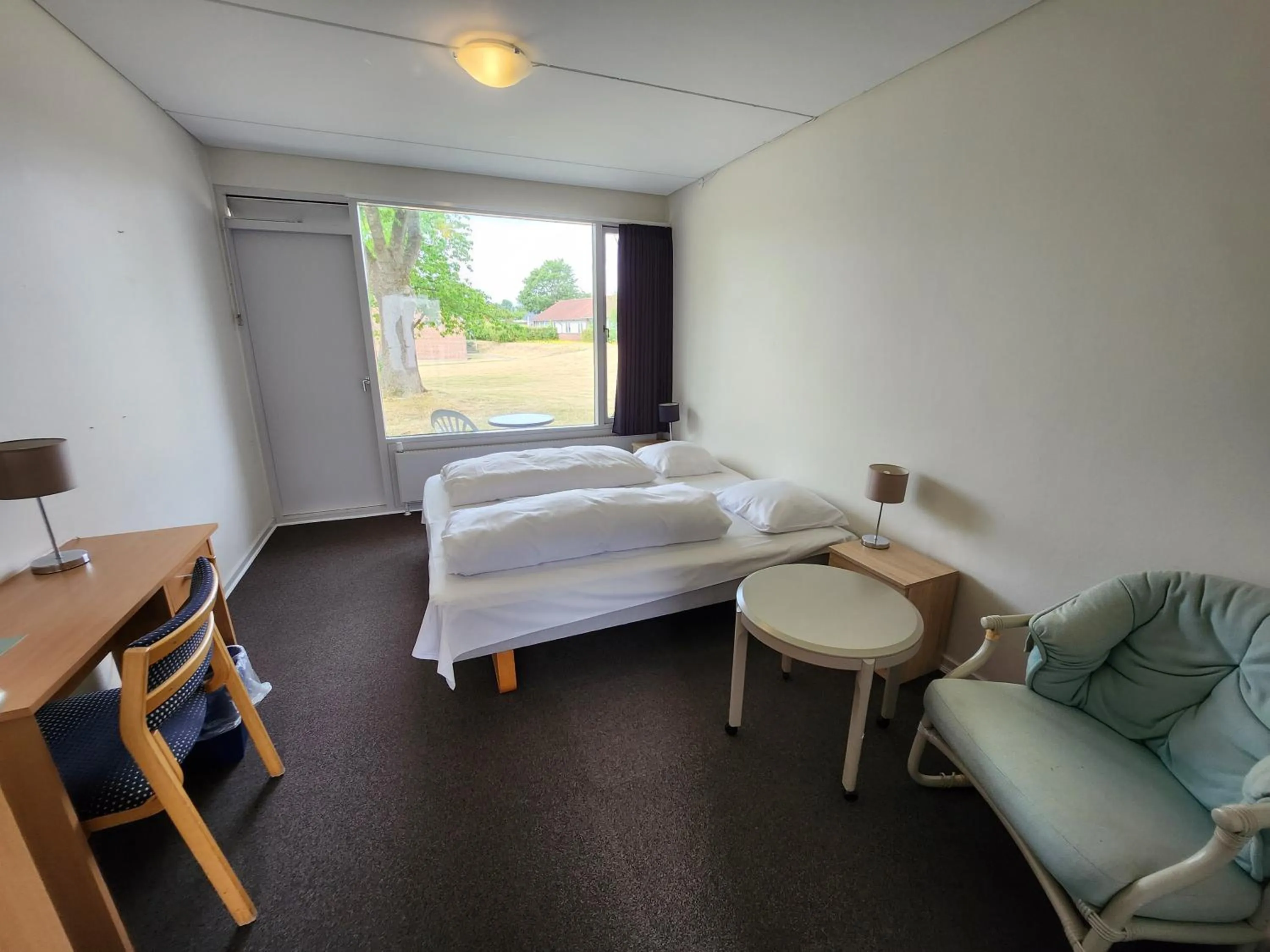 Photo of the whole room, Bed in Hotel Østersø