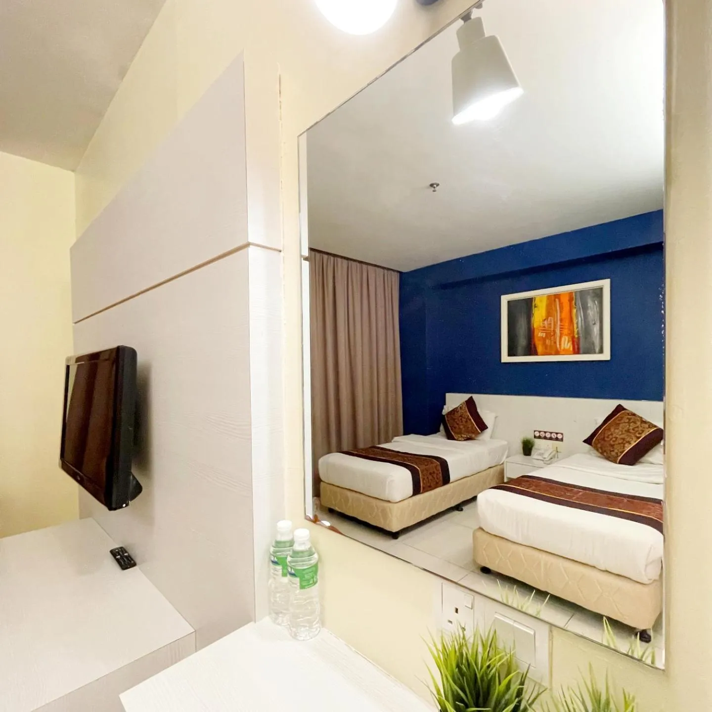 Bedroom in ESQ Shamelin Hotel