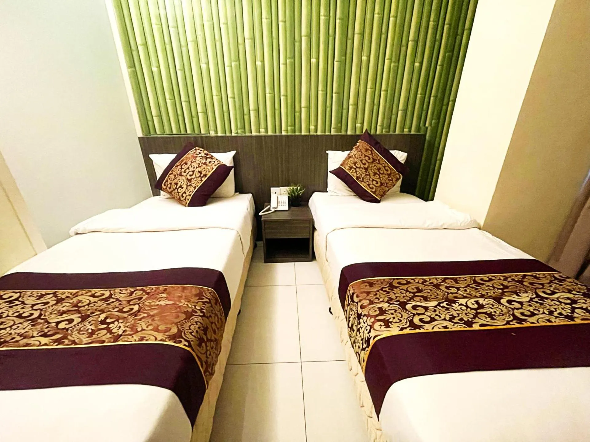 Bedroom in ESQ Shamelin Hotel