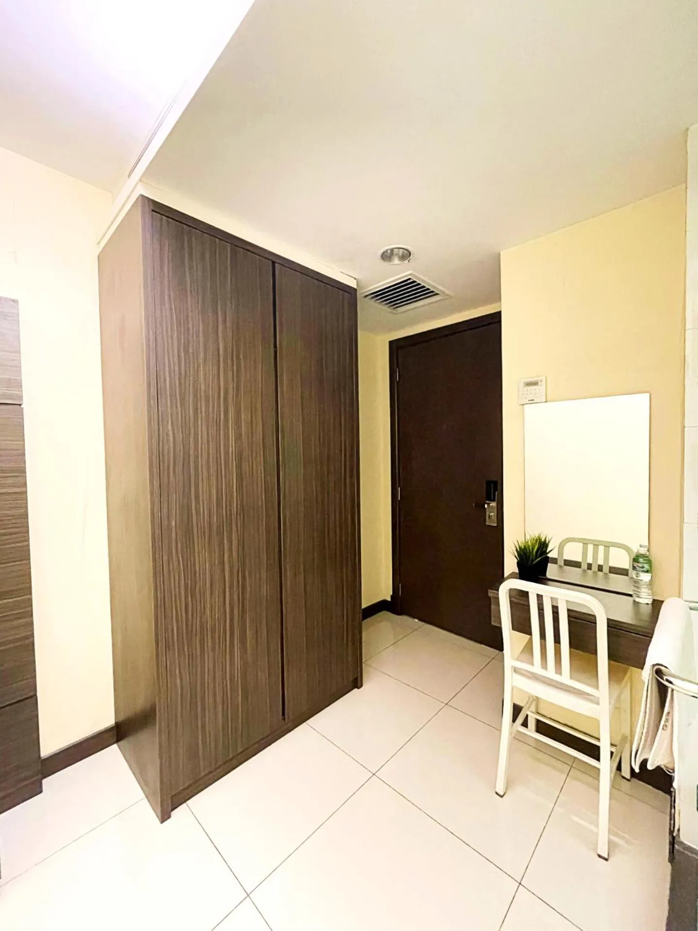 Bedroom in ESQ Shamelin Hotel