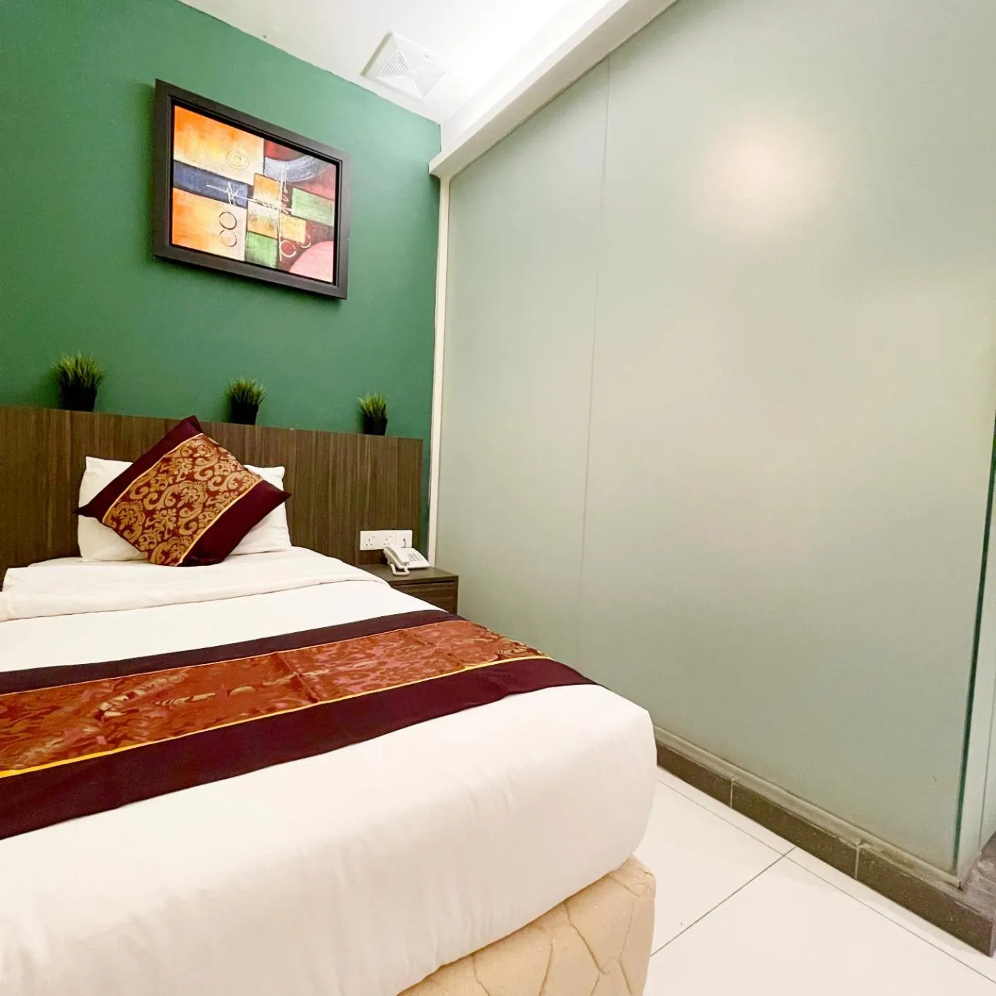 Bedroom in ESQ Shamelin Hotel