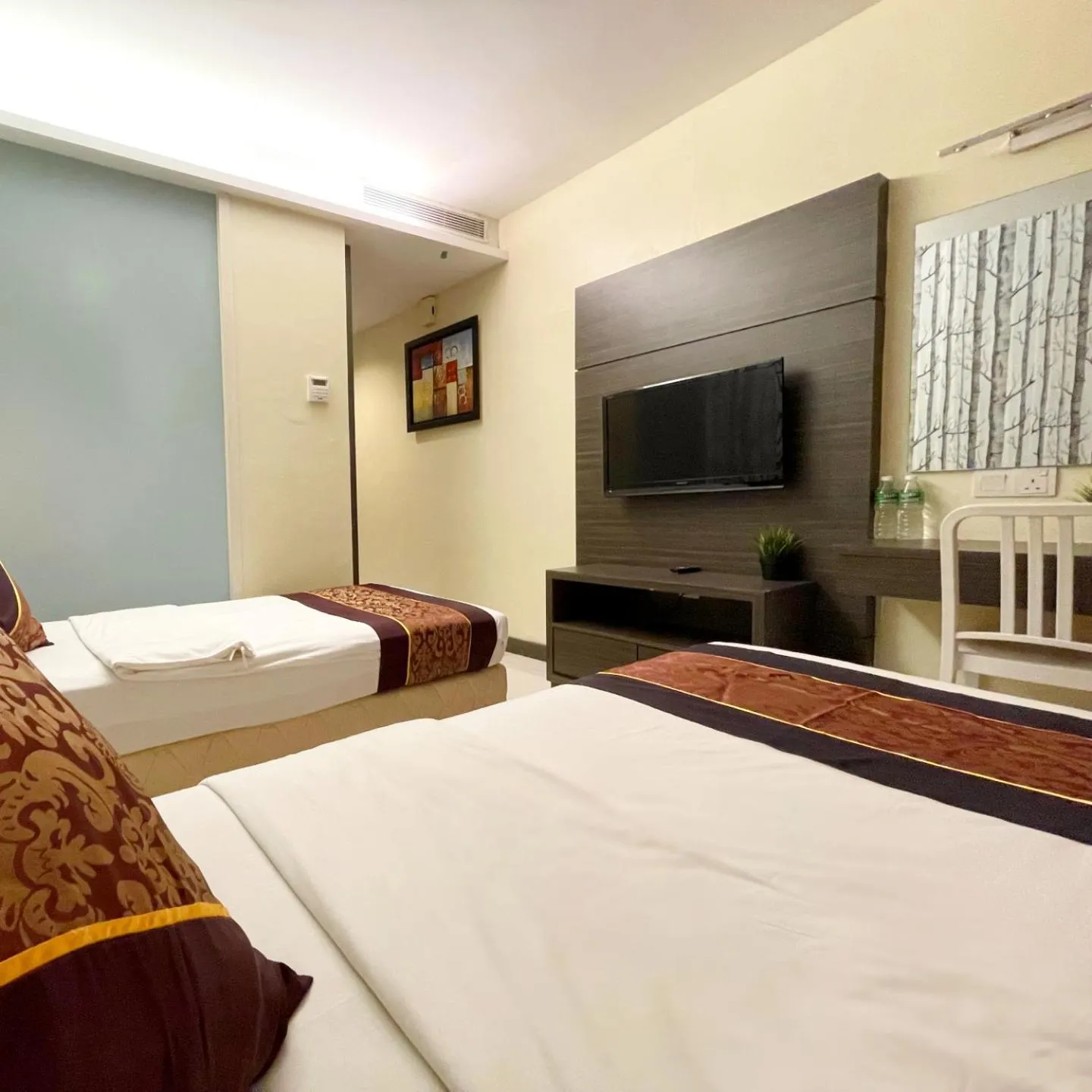 Bedroom in ESQ Shamelin Hotel