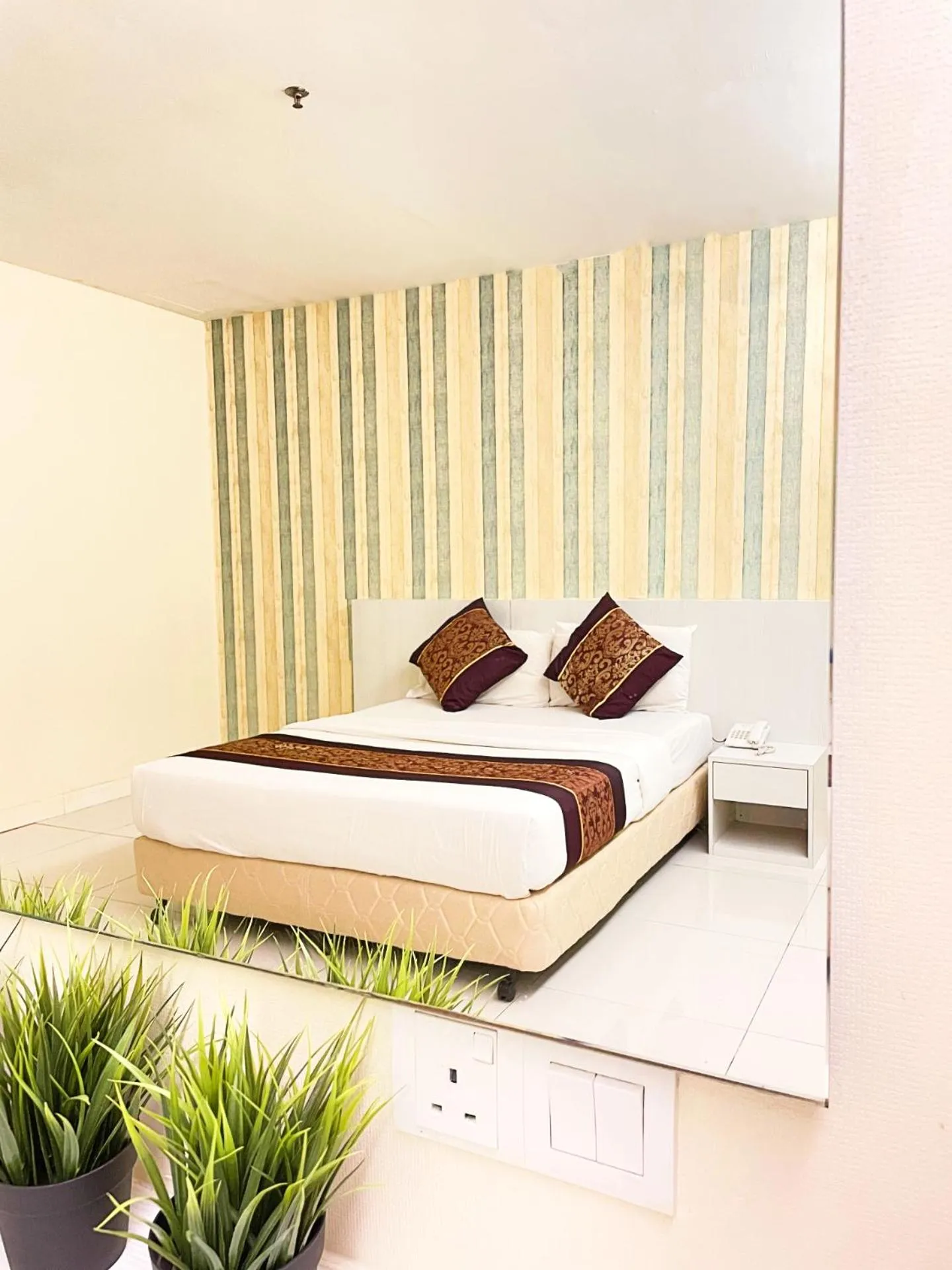 Bedroom in ESQ Shamelin Hotel