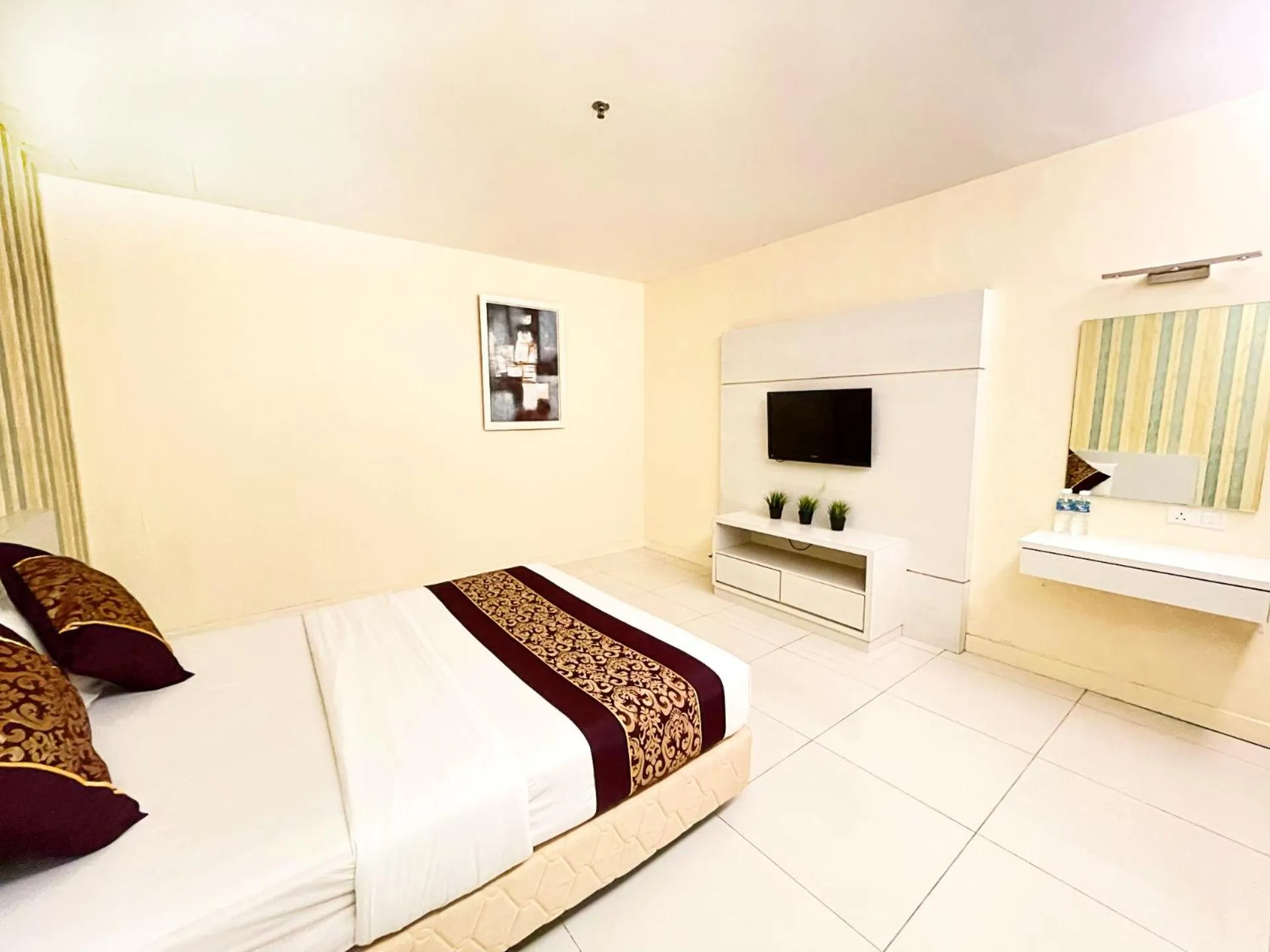 Bedroom in ESQ Shamelin Hotel