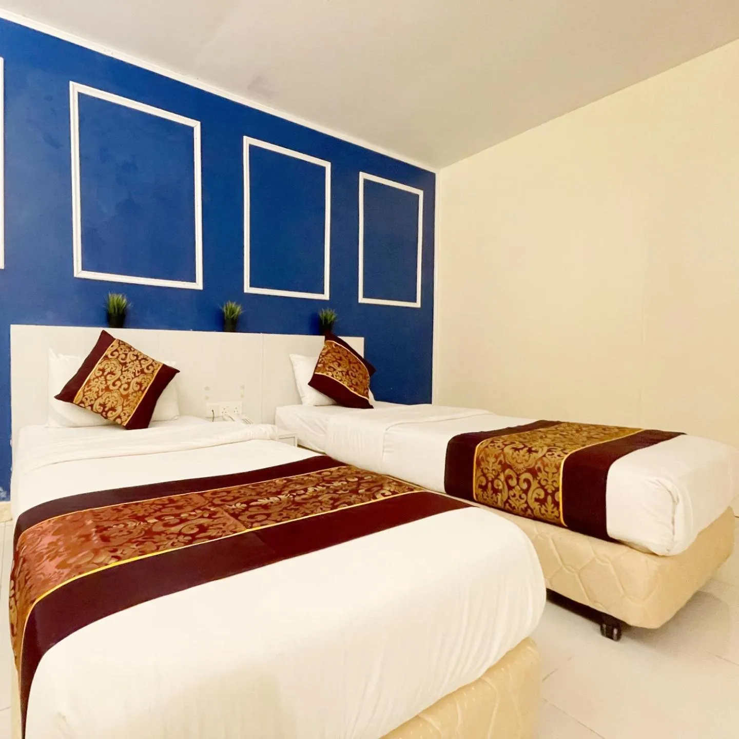 Bedroom in ESQ Shamelin Hotel