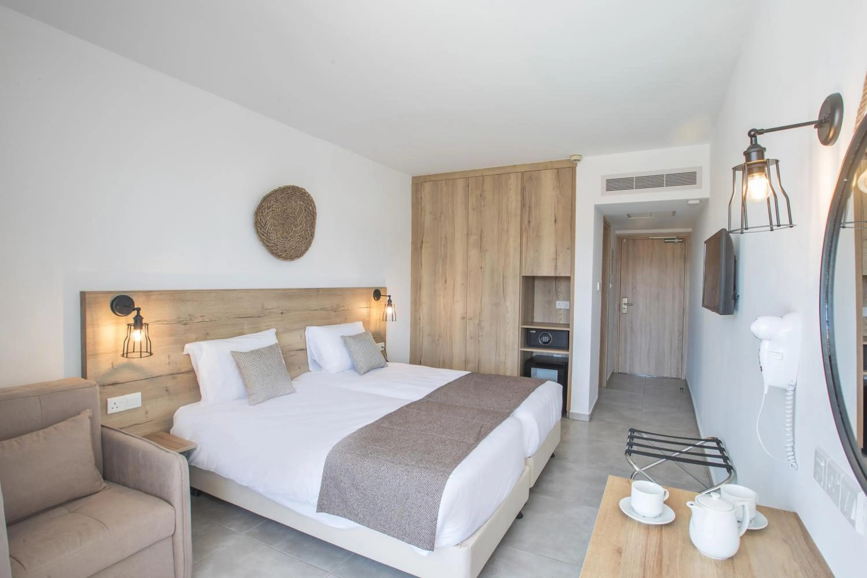 Bed in Bohemian Gardens Hotel