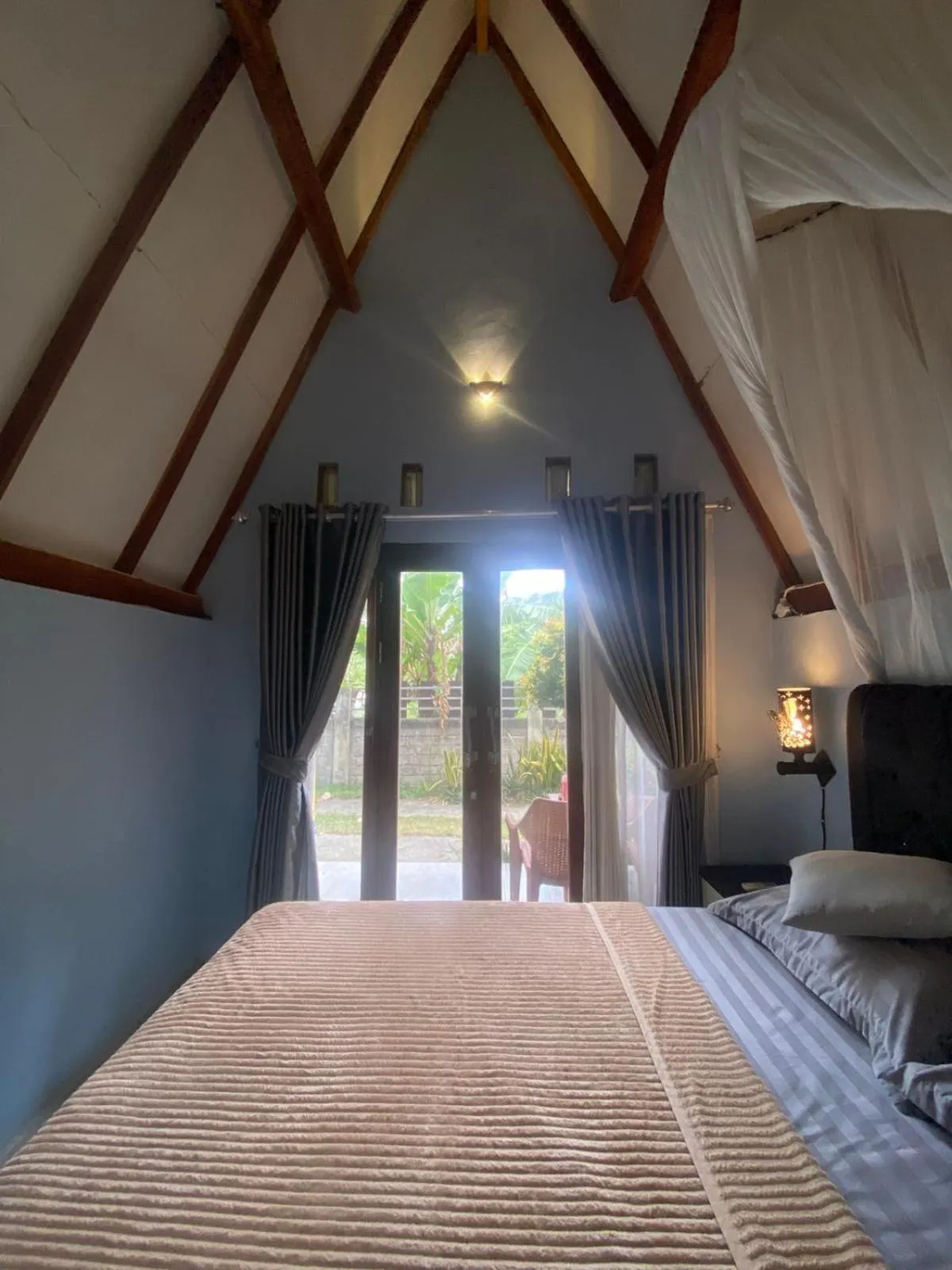 Bed in Bale Baleku Homestay