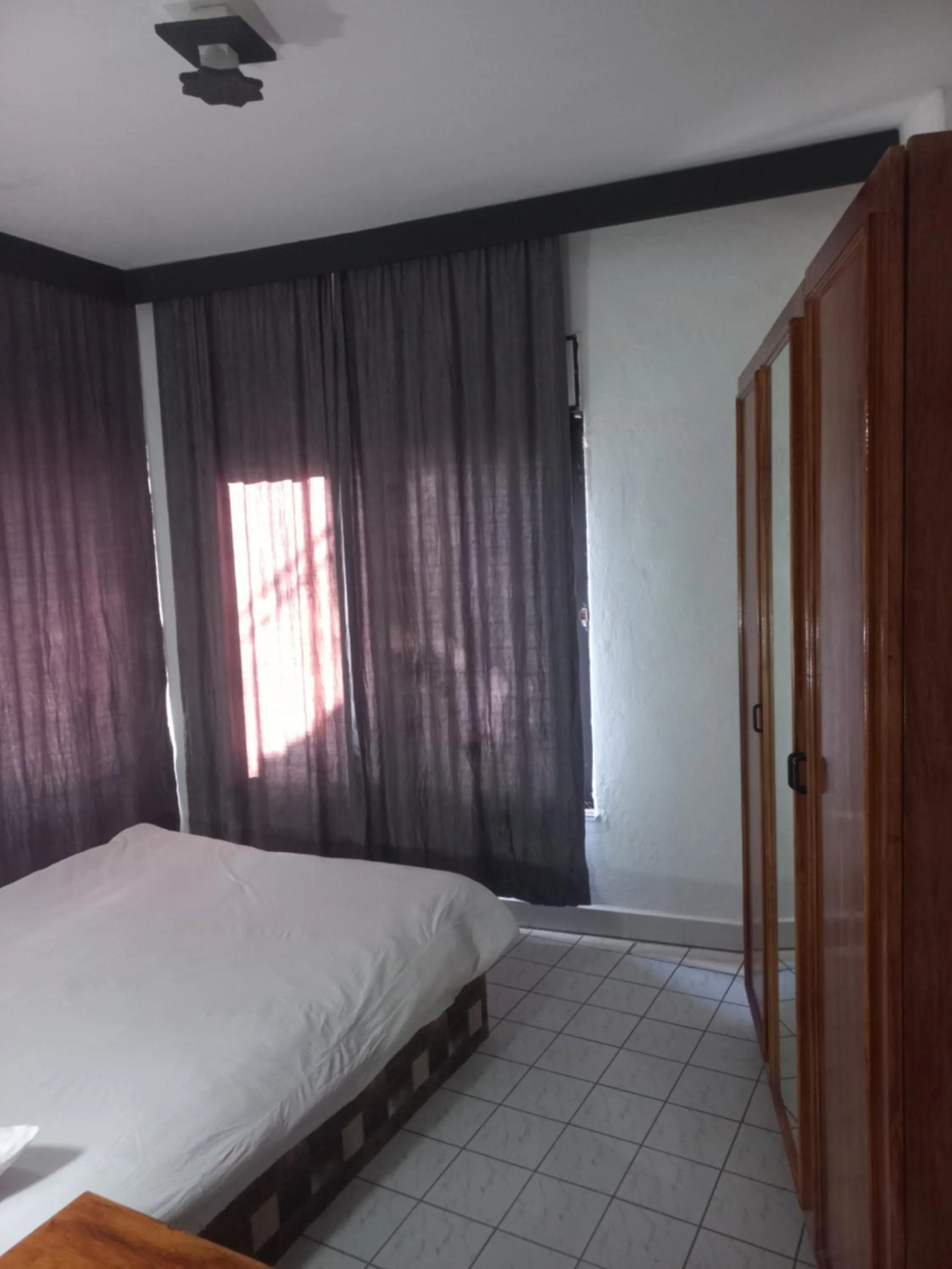 Bed in Delphin Hotel Side