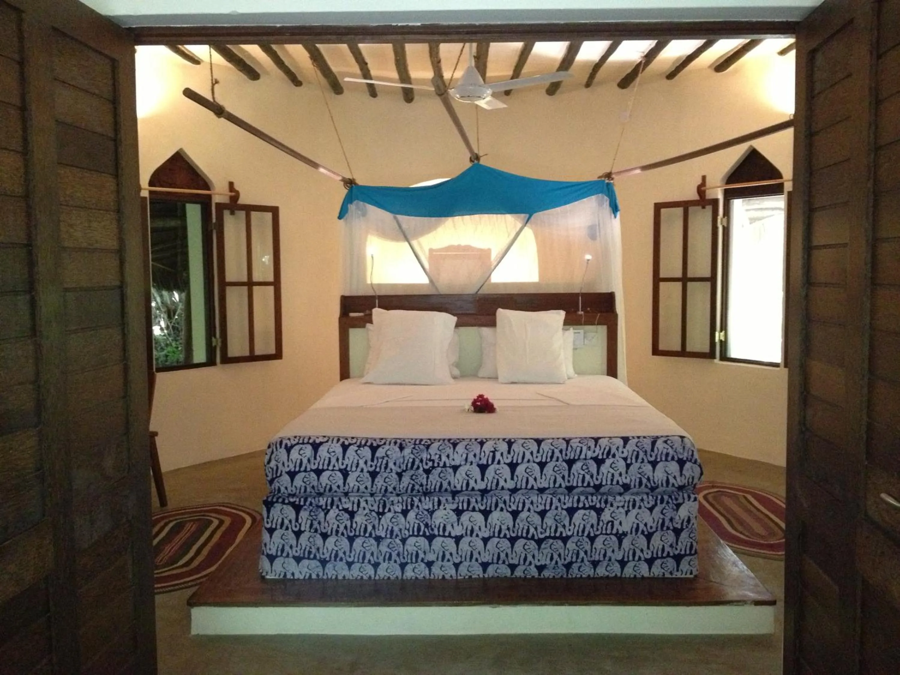 Bed in Unguja Lodge