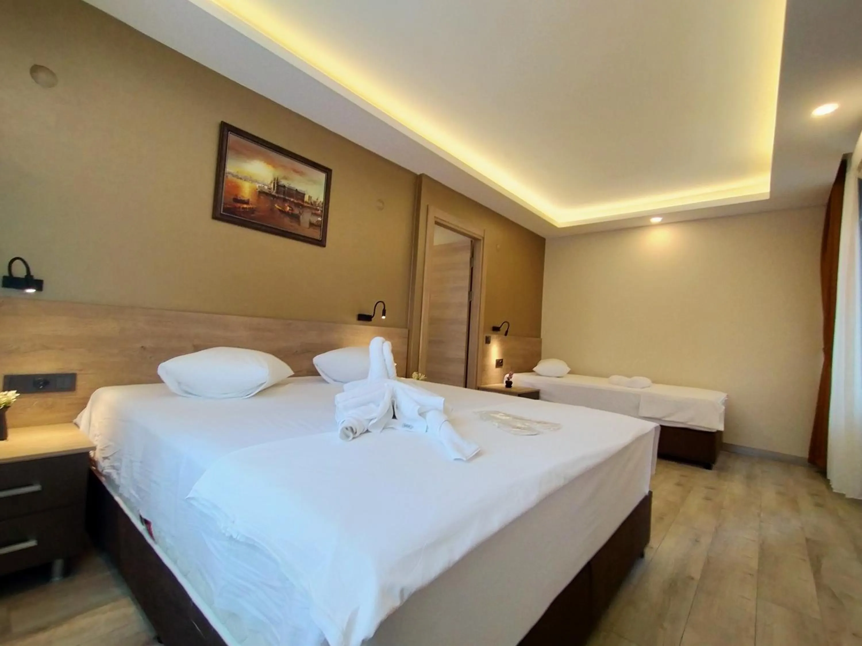 Bed in Palmiye Royale Palace