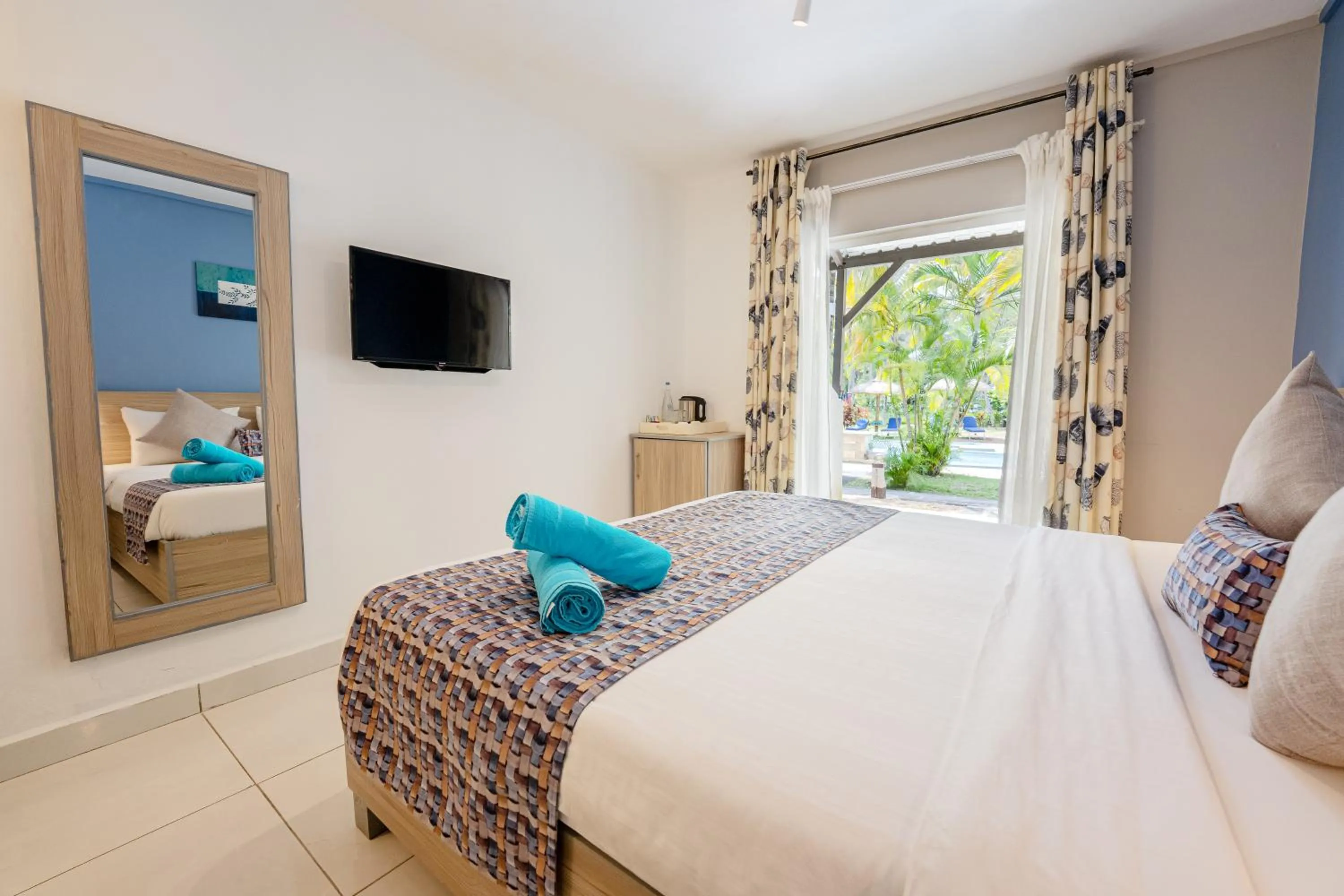 Bed in Le Grand Bleu Hotel