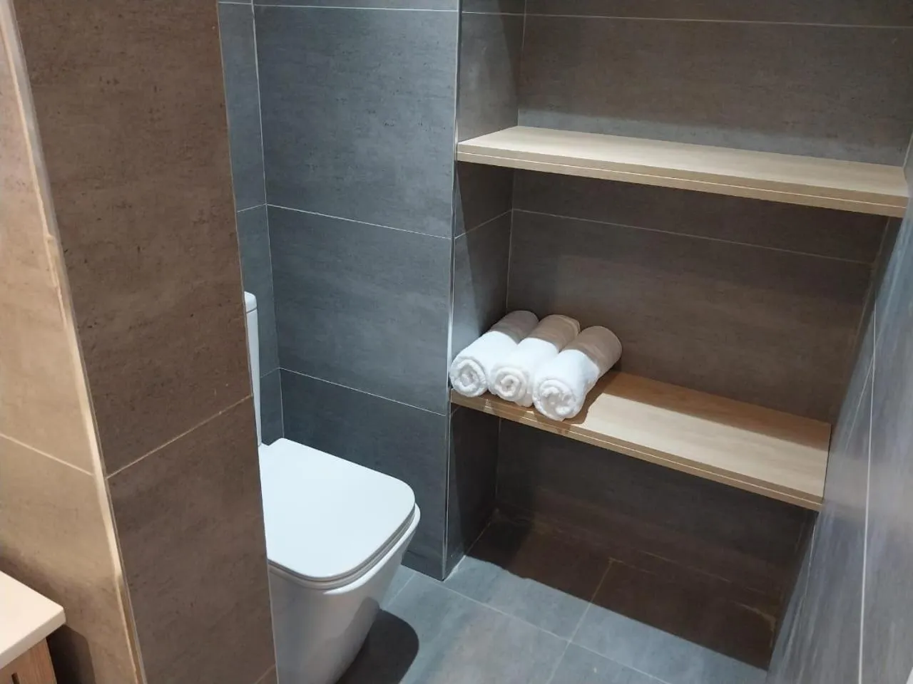 Toilet in Le Grand Bleu Hotel