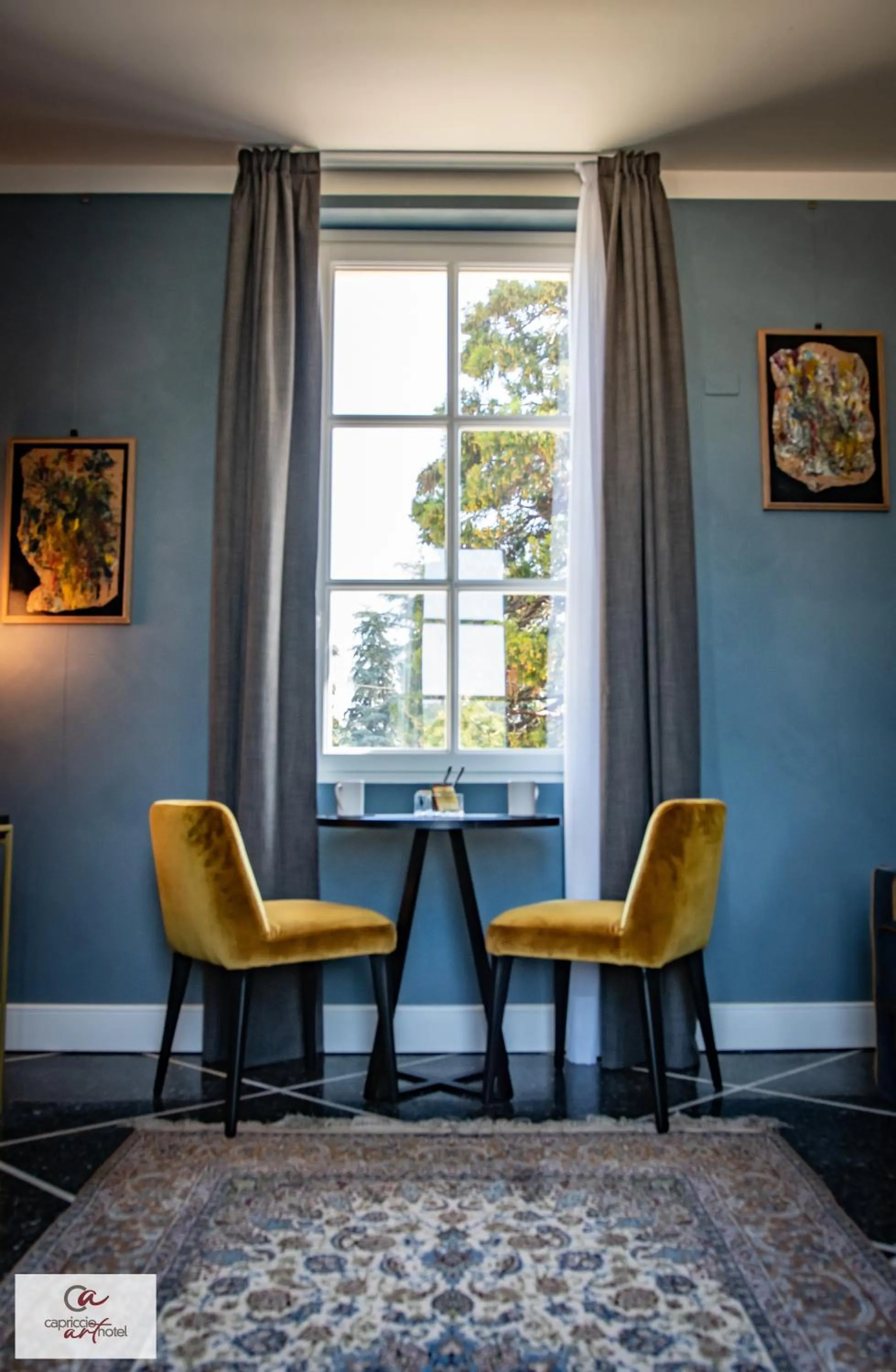 Living room in Capriccio Art Hotel