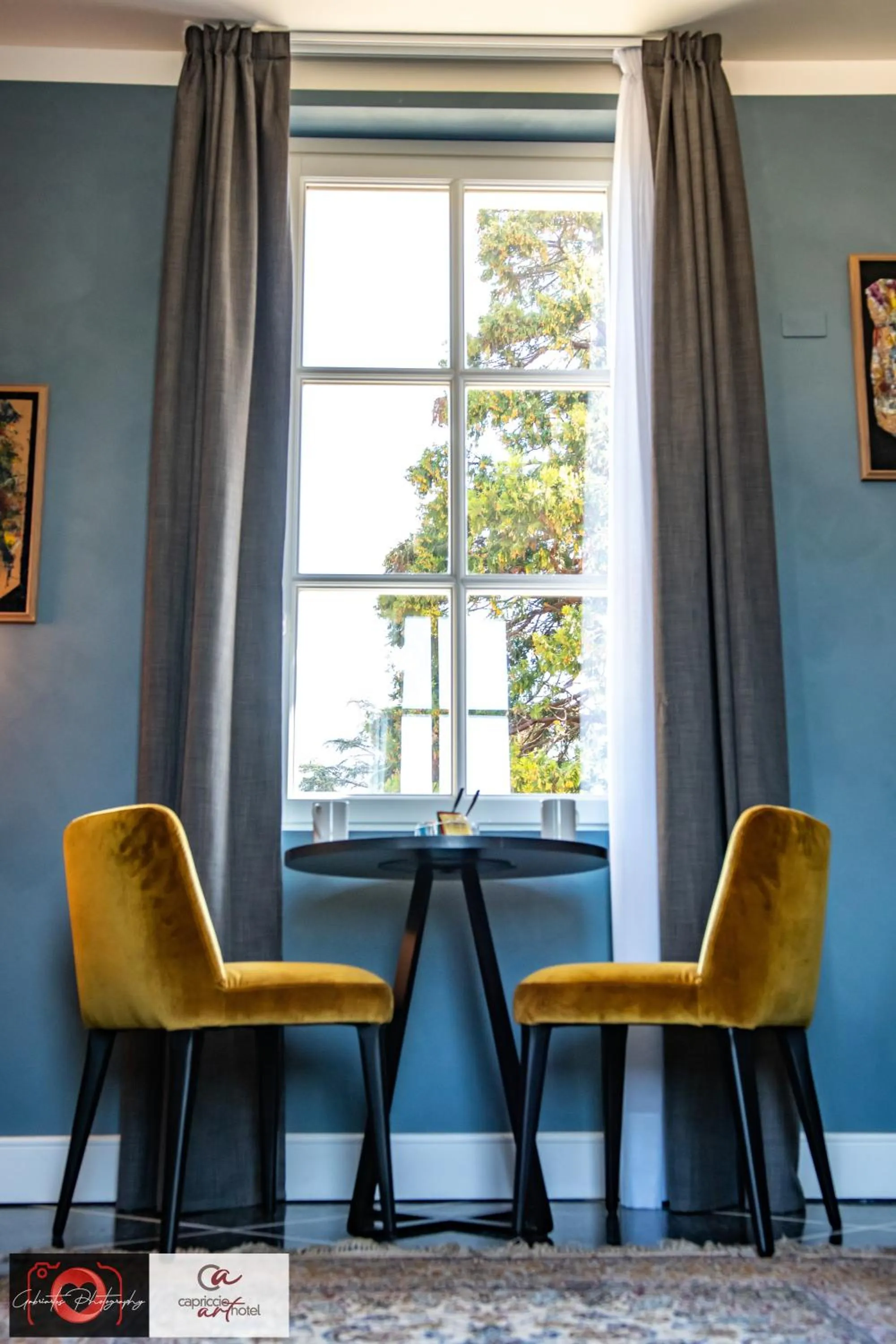 Living room in Capriccio Art Hotel