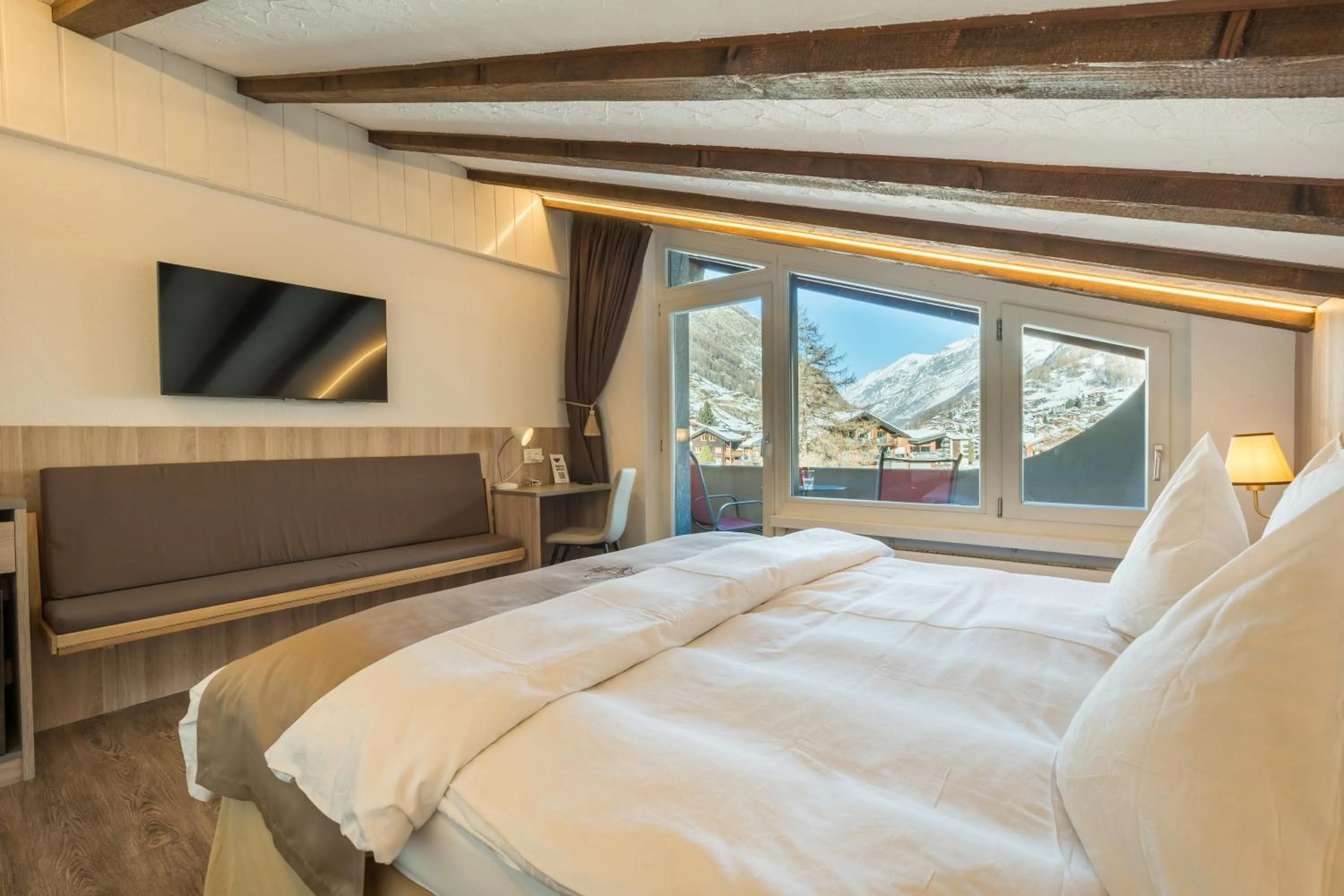 Bed in Hotel Beau Rivage