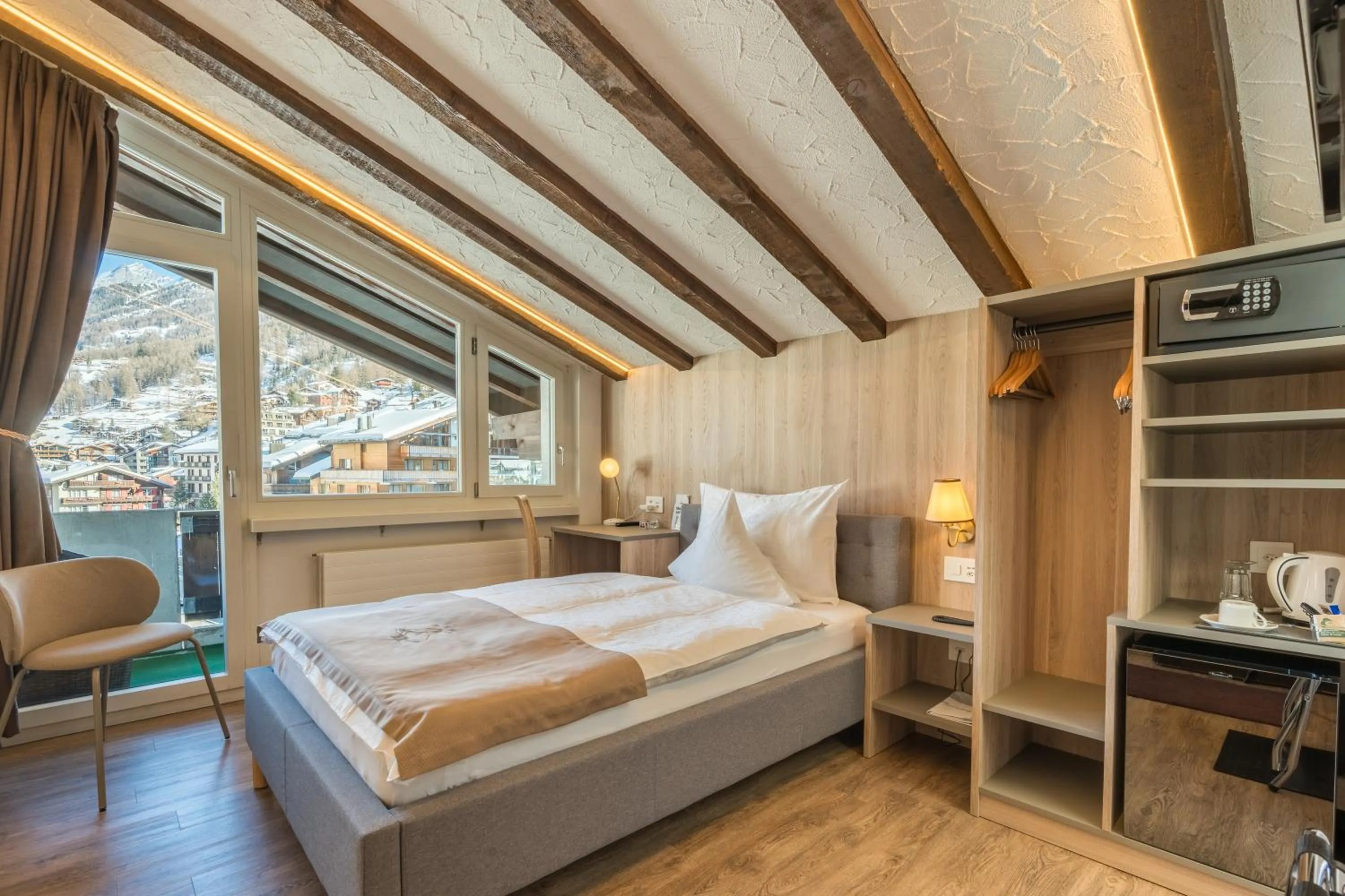 Bed in Hotel Beau Rivage