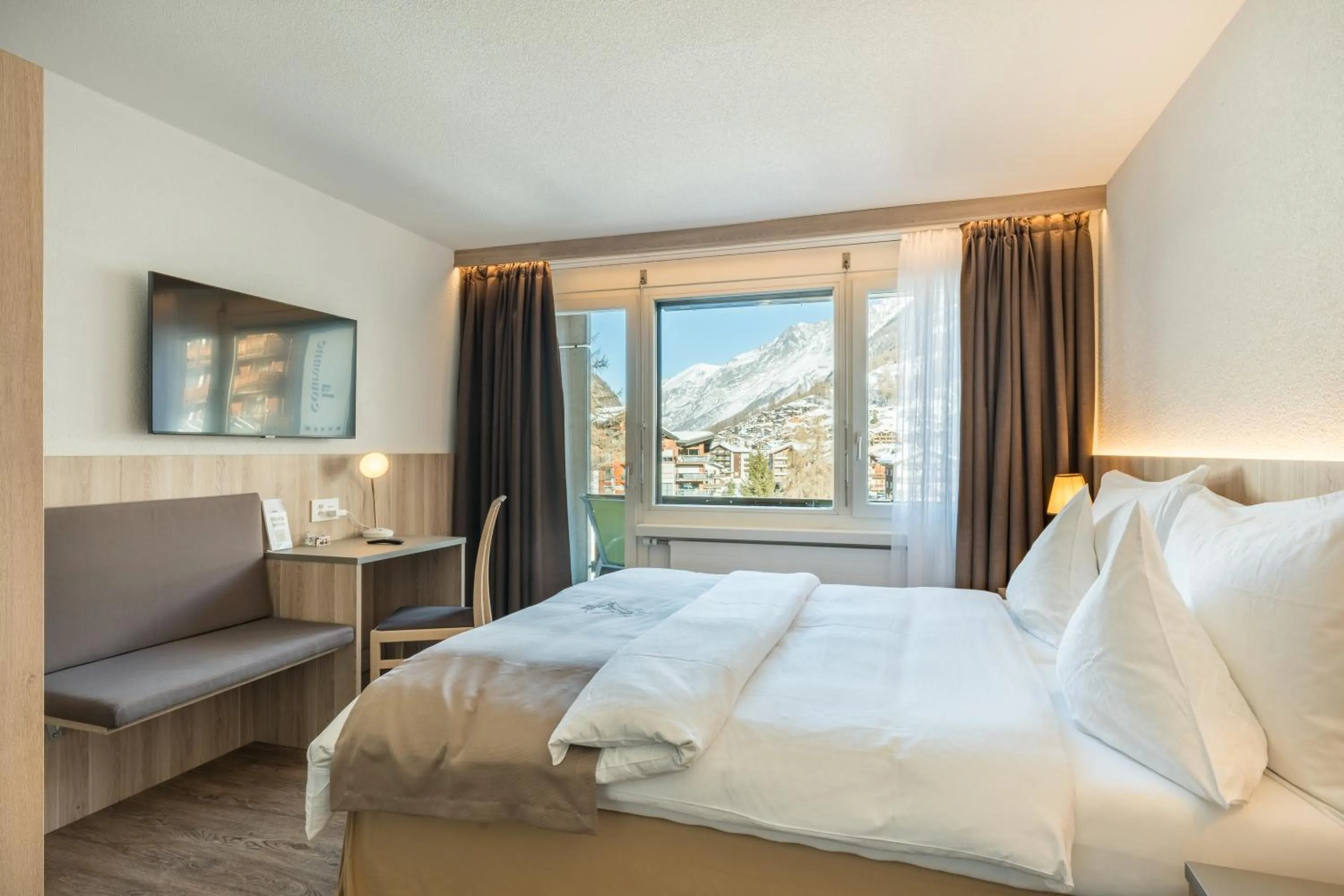 Bed in Hotel Beau Rivage