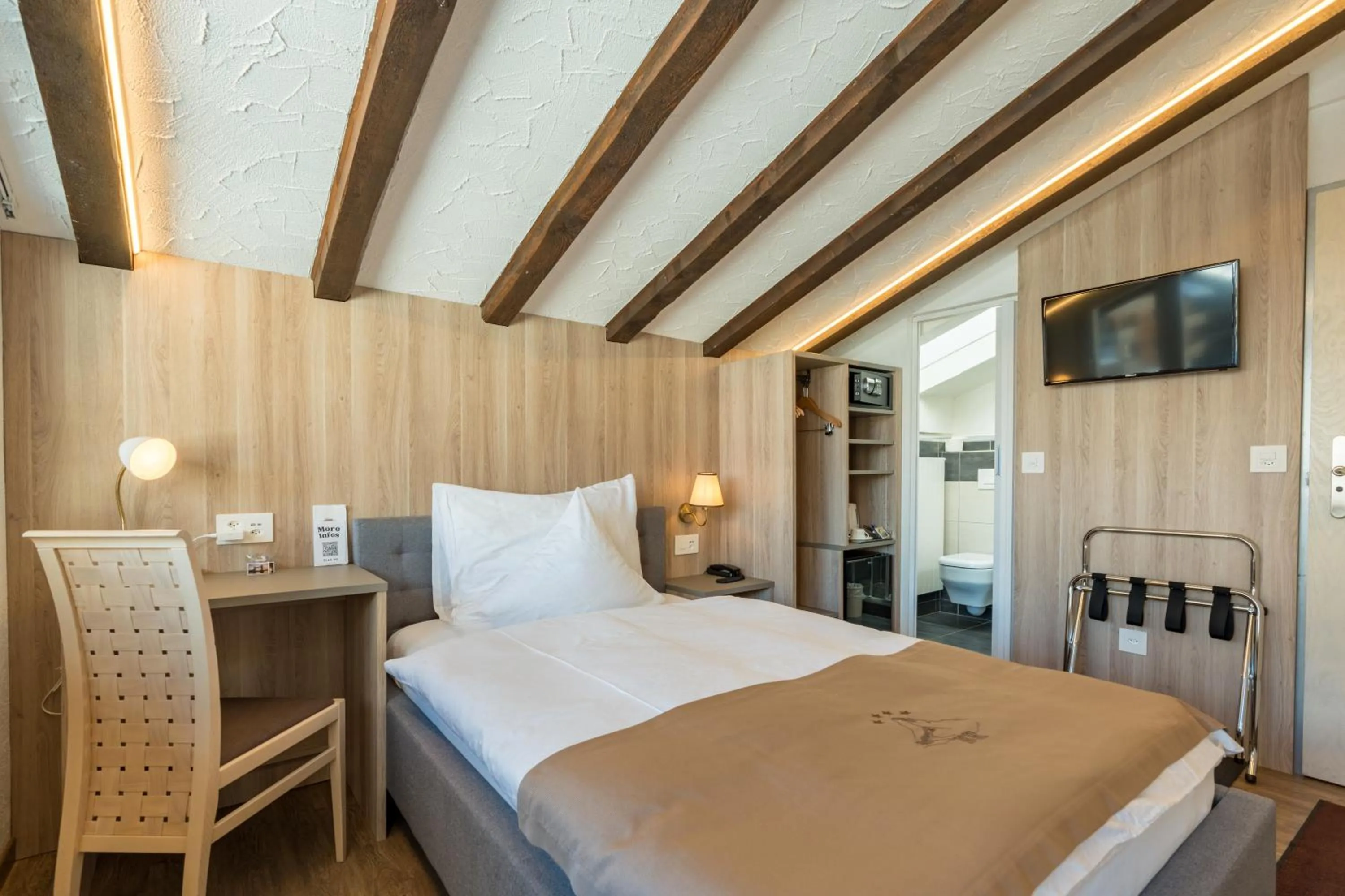 Bed in Hotel Beau Rivage