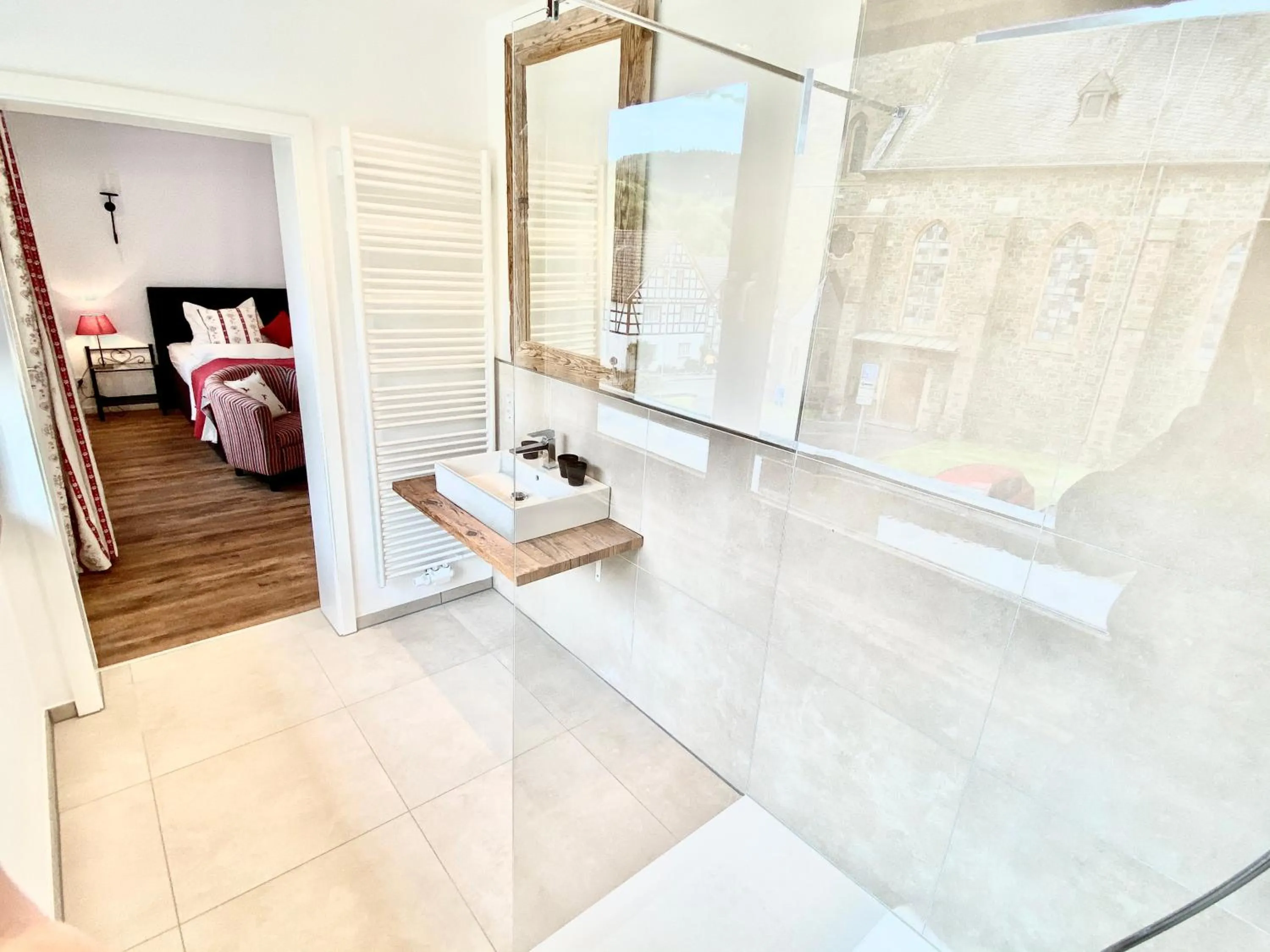 Bathroom, Bed in JUULS - Natur Hotel Garni